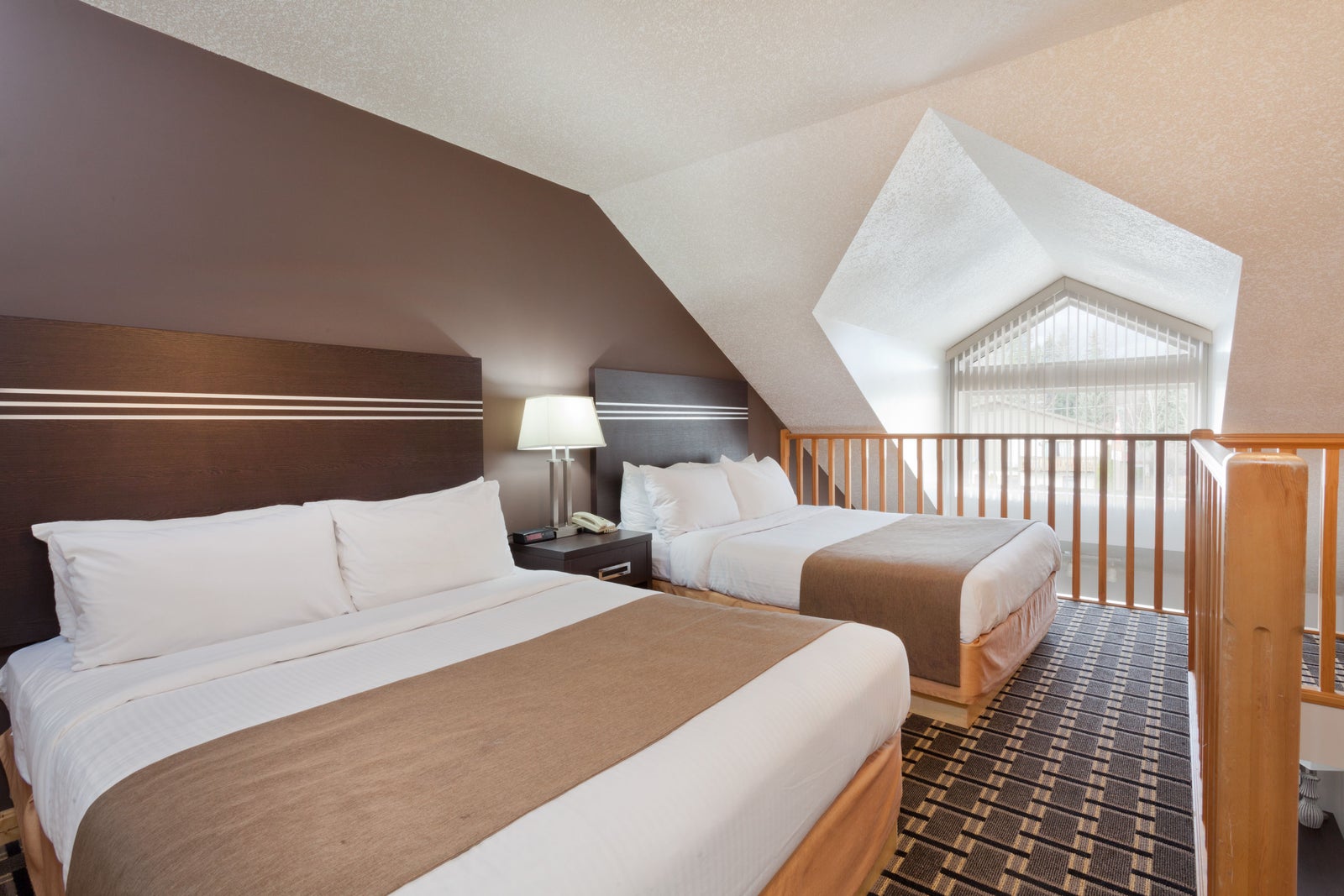 2 Queen 1 Single Bed Efficiency Room