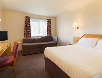 1 Double Bed with Sofa Bed Room