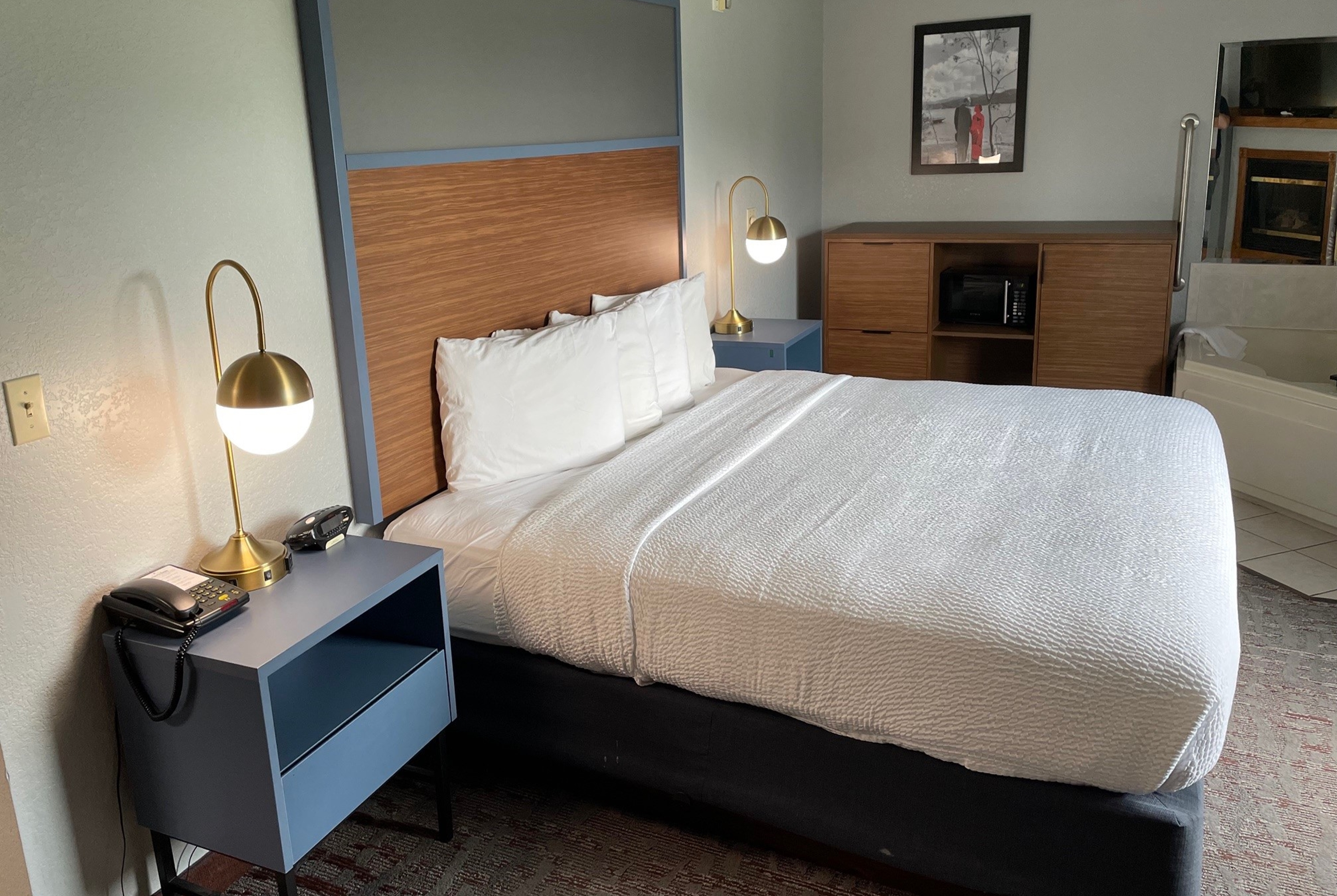 Guest room at the AmericInn by Wyndham Ankeny/Des Moines in Ankeny, Iowa