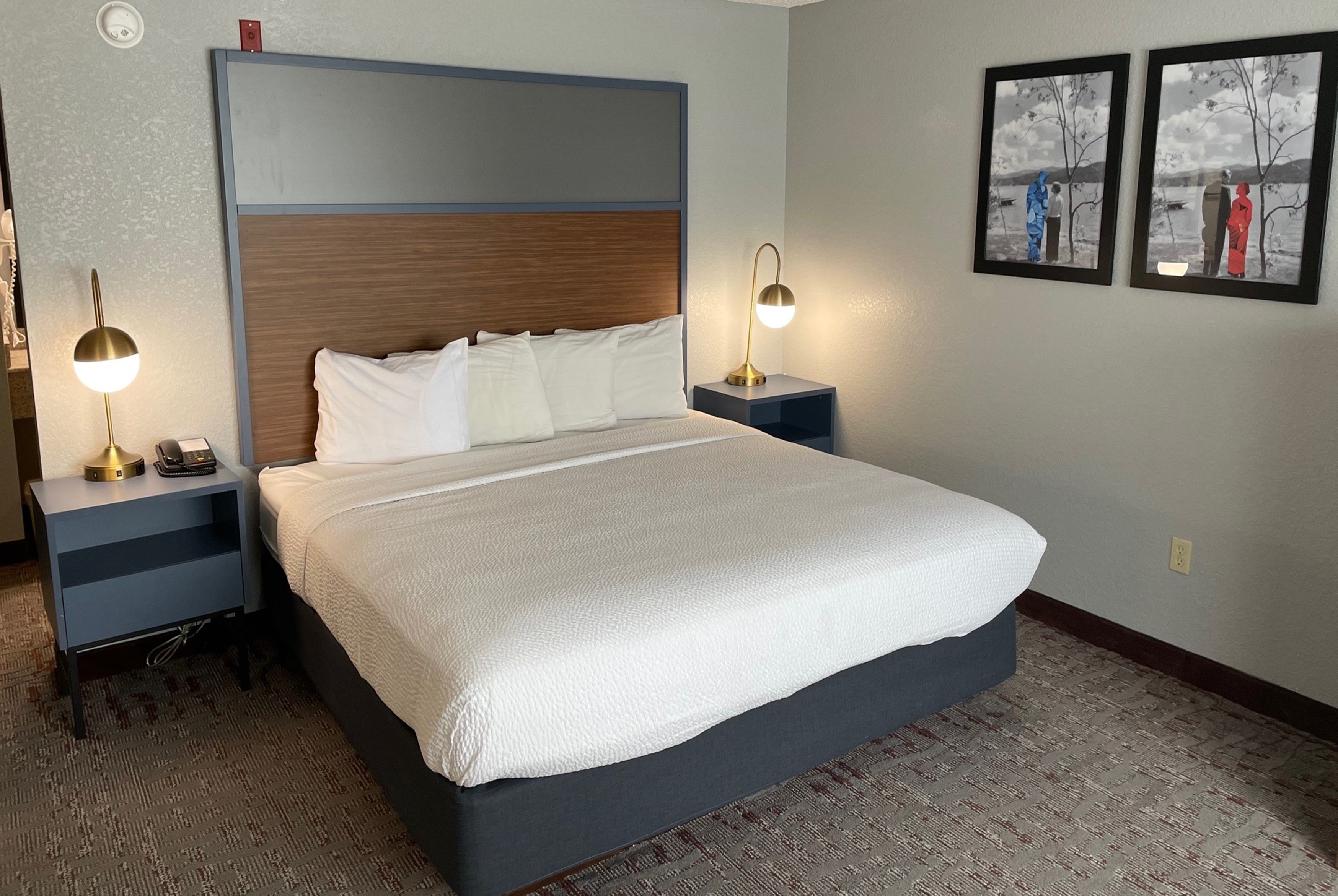 Guest room at the AmericInn by Wyndham Ankeny/Des Moines in Ankeny, Iowa