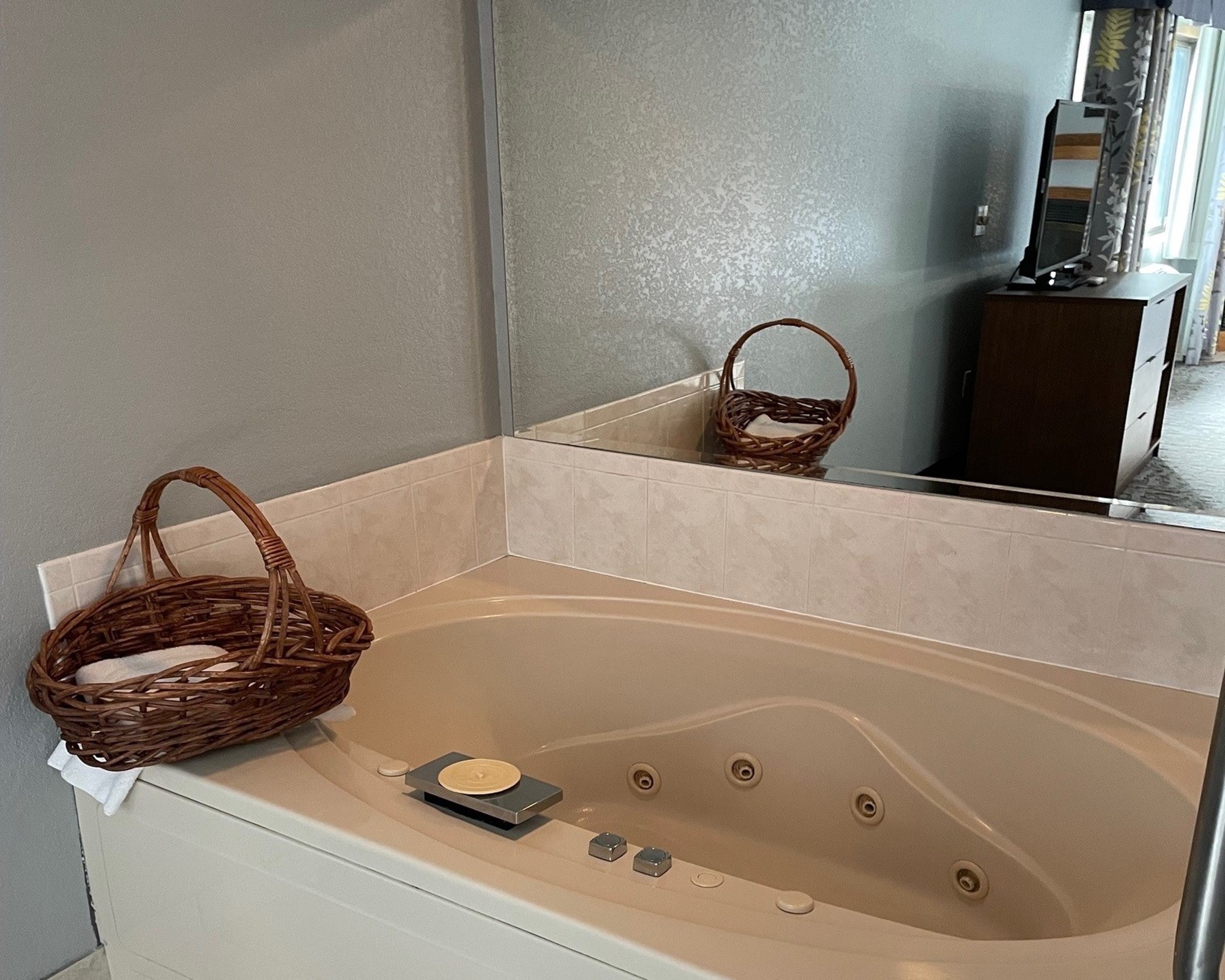 Guest room at the AmericInn by Wyndham Ankeny/Des Moines in Ankeny, Iowa