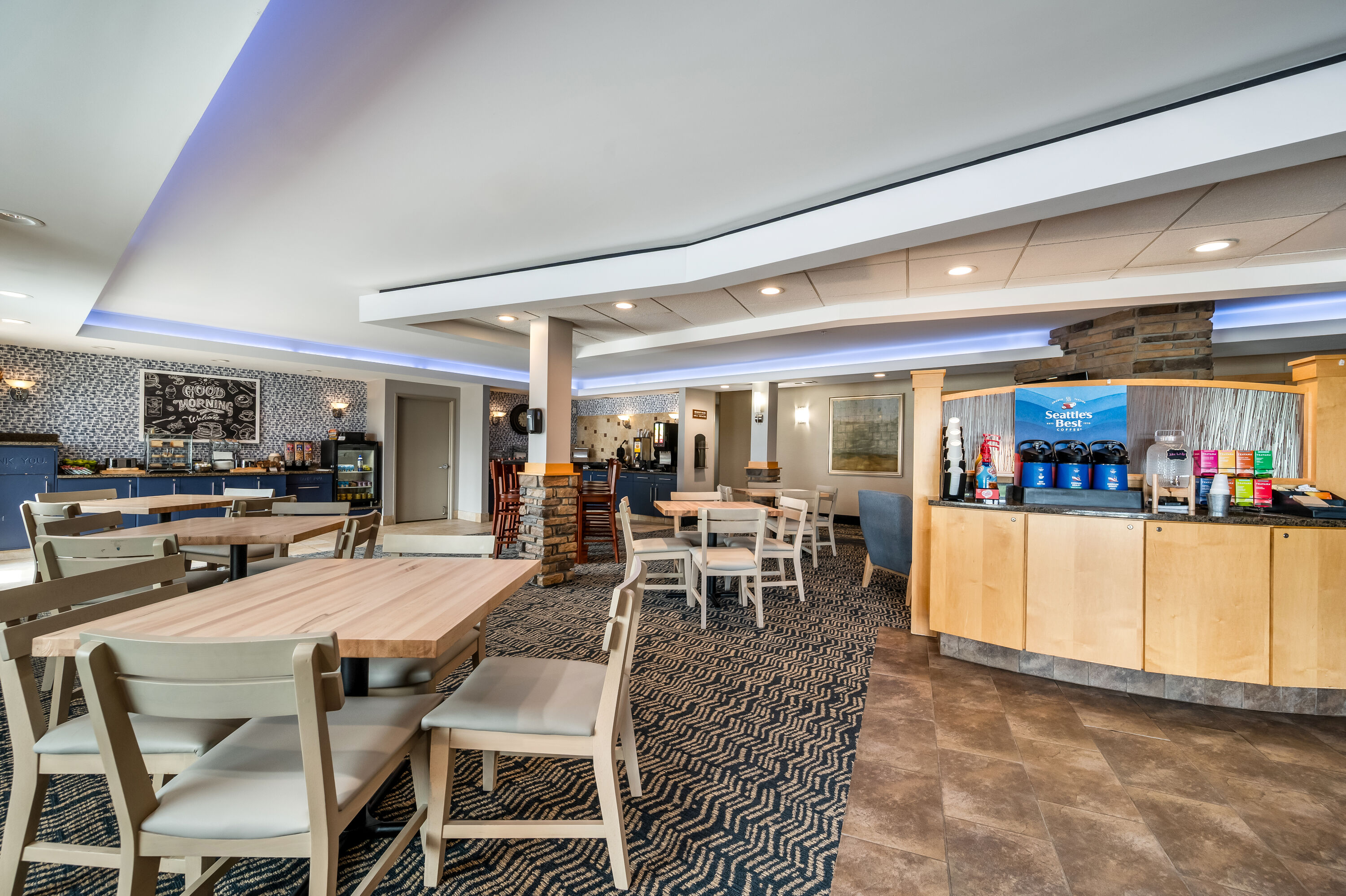 AmericInn by Wyndham Fairfield restaurant breakfast area with seating in Fairfield, Iowa