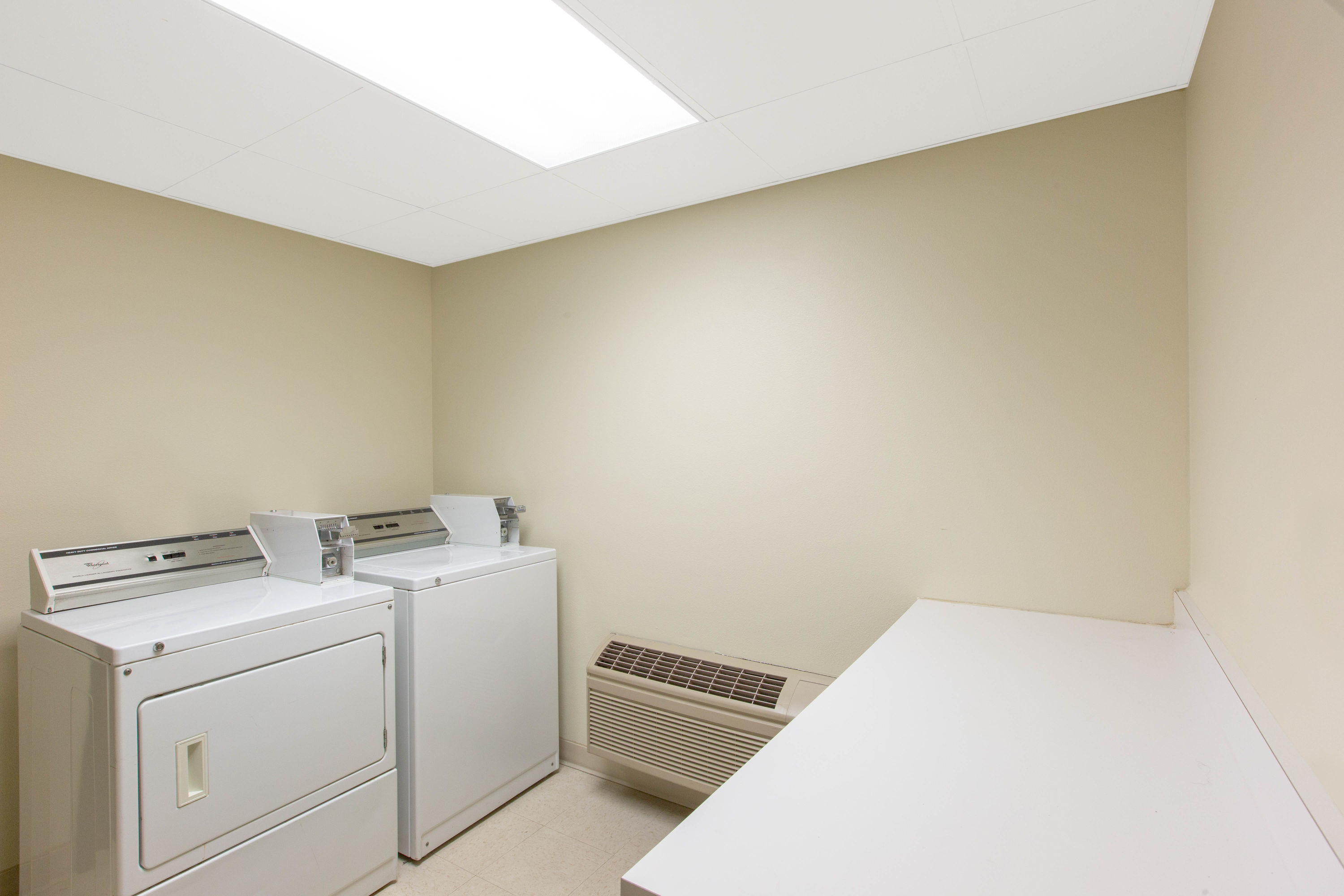 Laundry facilities at AmericInn by Wyndham Ottumwa in Ottumwa, Iowa