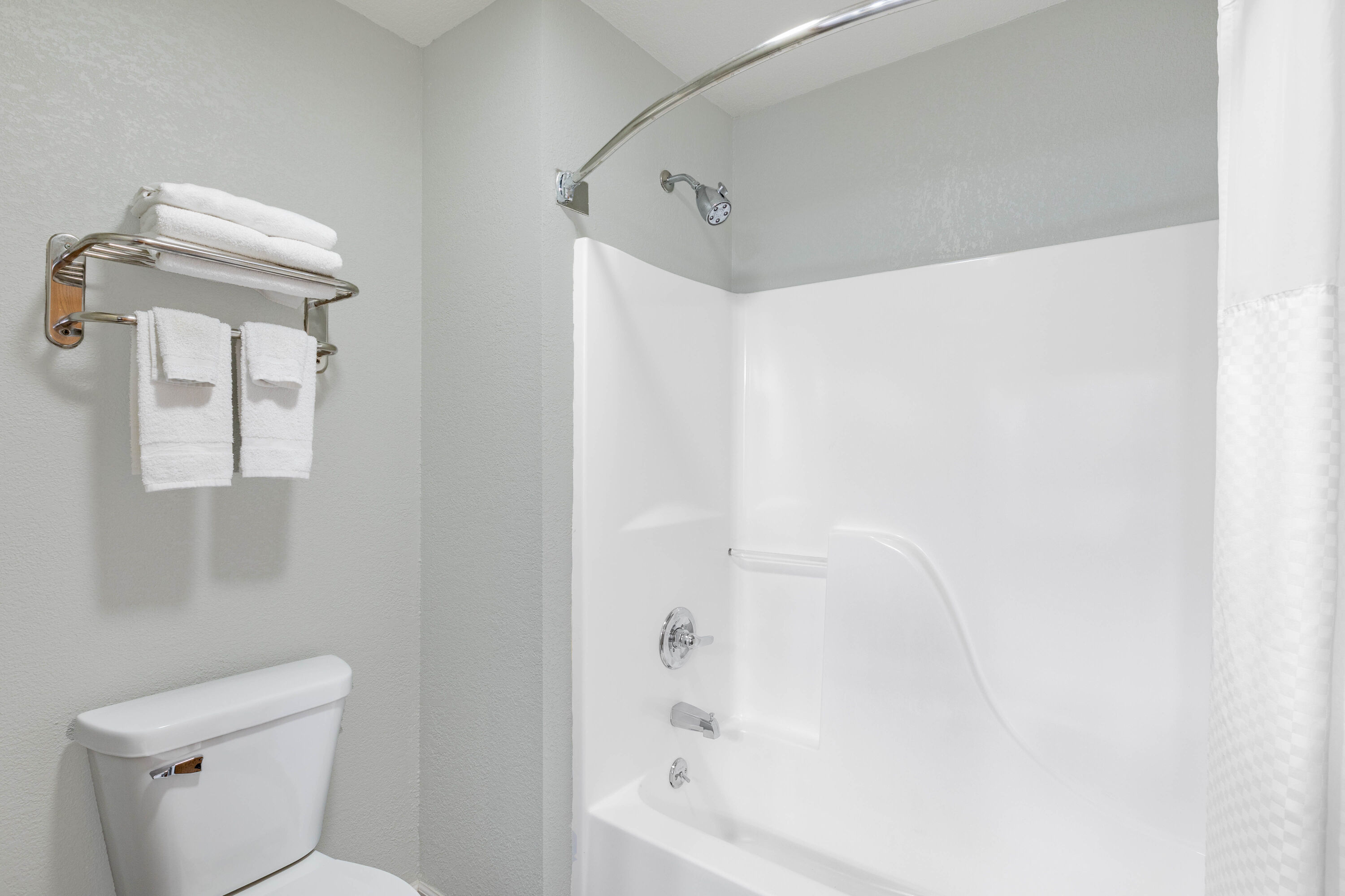 Guest room bath at the AmericInn by Wyndham Pella in Pella, Iowa