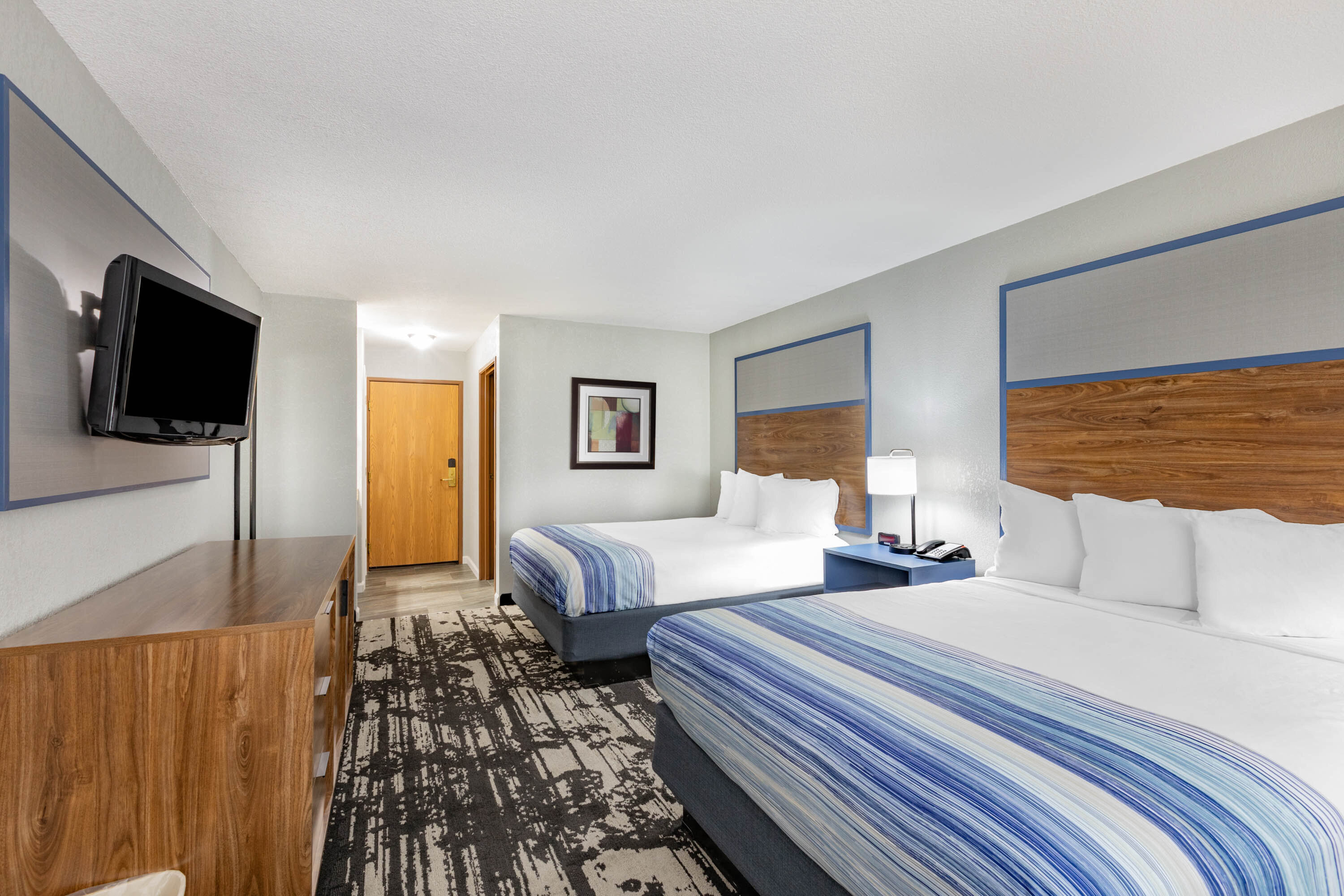 Guest room at the AmericInn by Wyndham Pella in Pella, Iowa