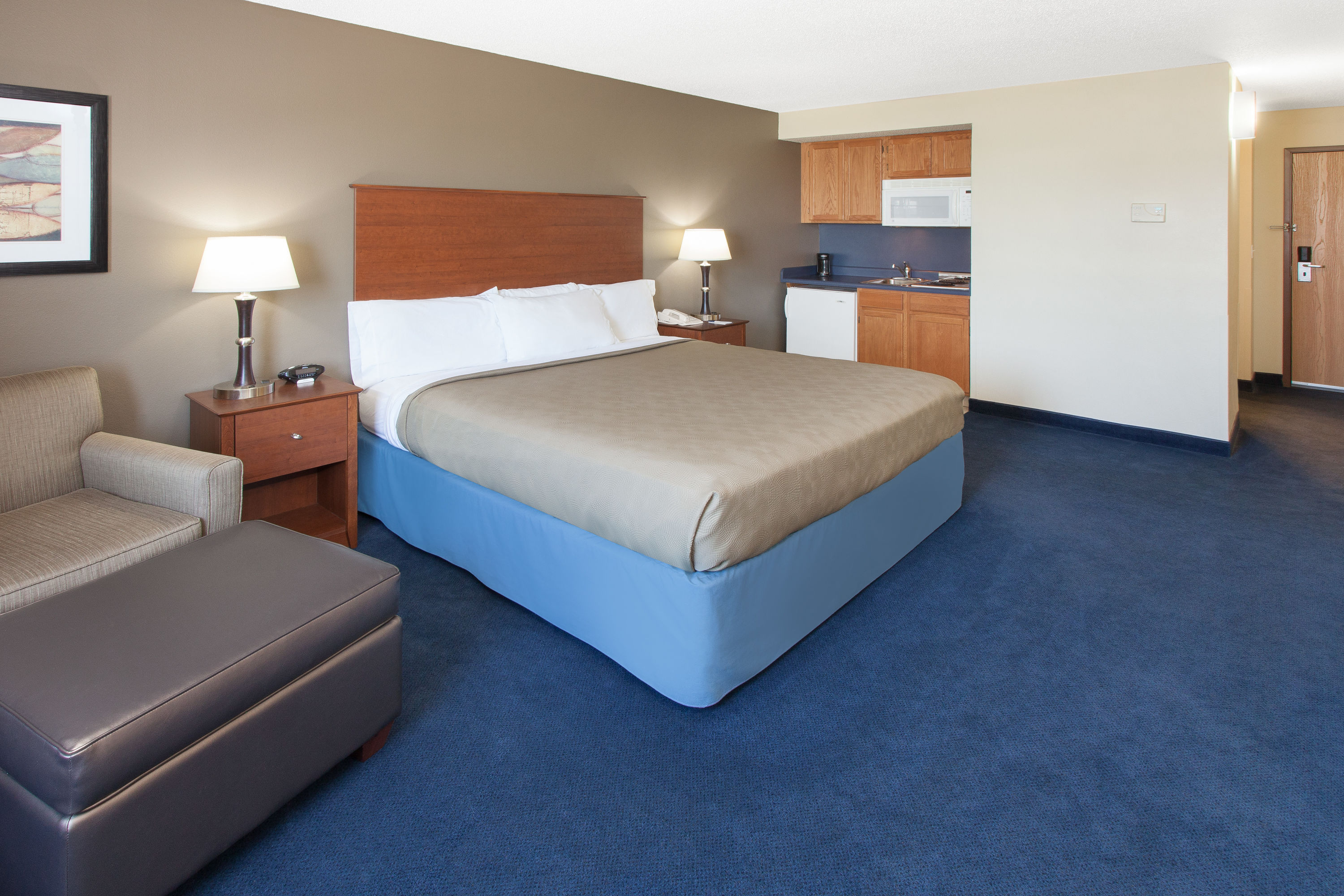 Guest room at the AmericInn by Wyndham Webster City in Webster City, Iowa