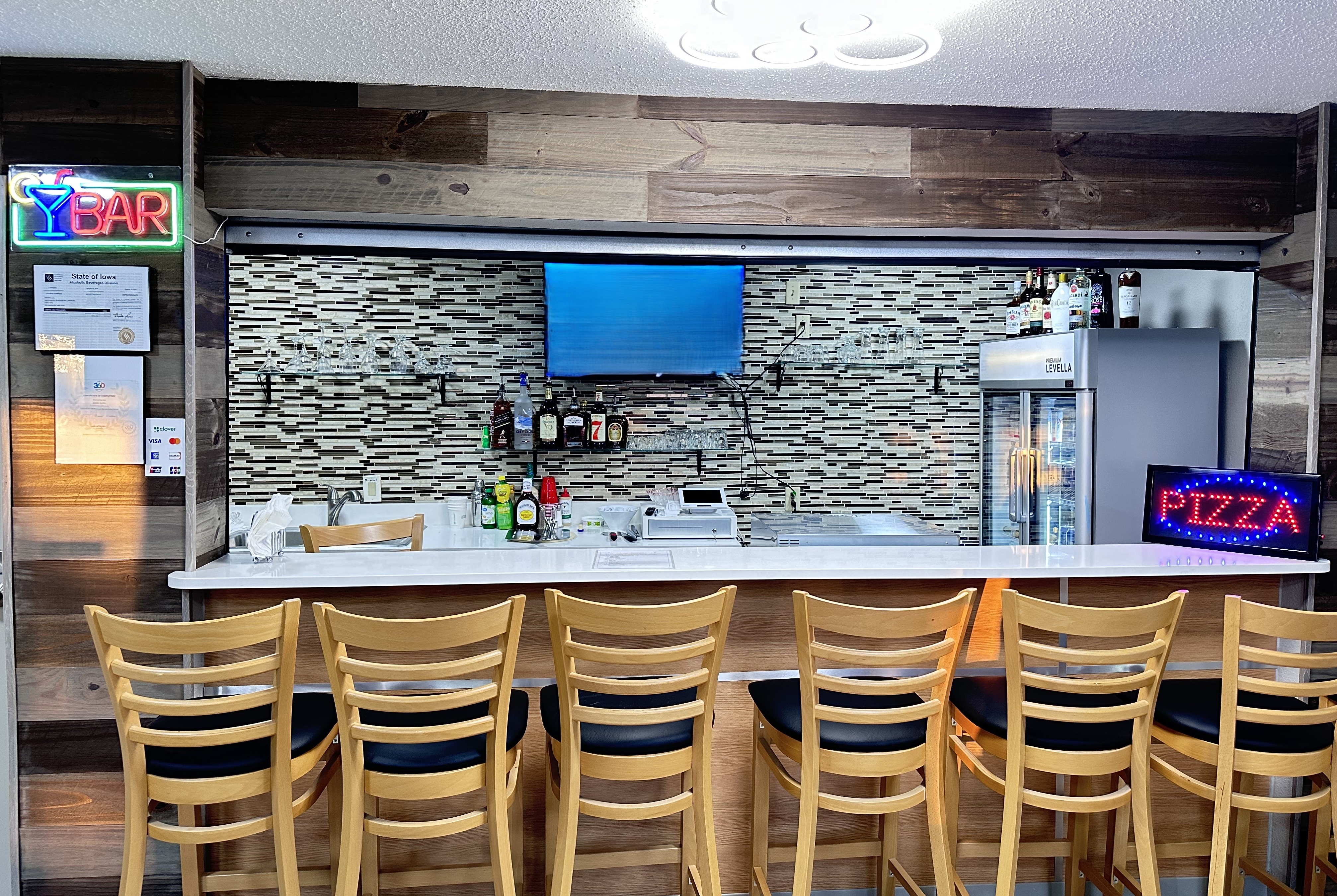 Bar at AmericInn by Wyndham Williamsburg in Williamsburg, Iowa
