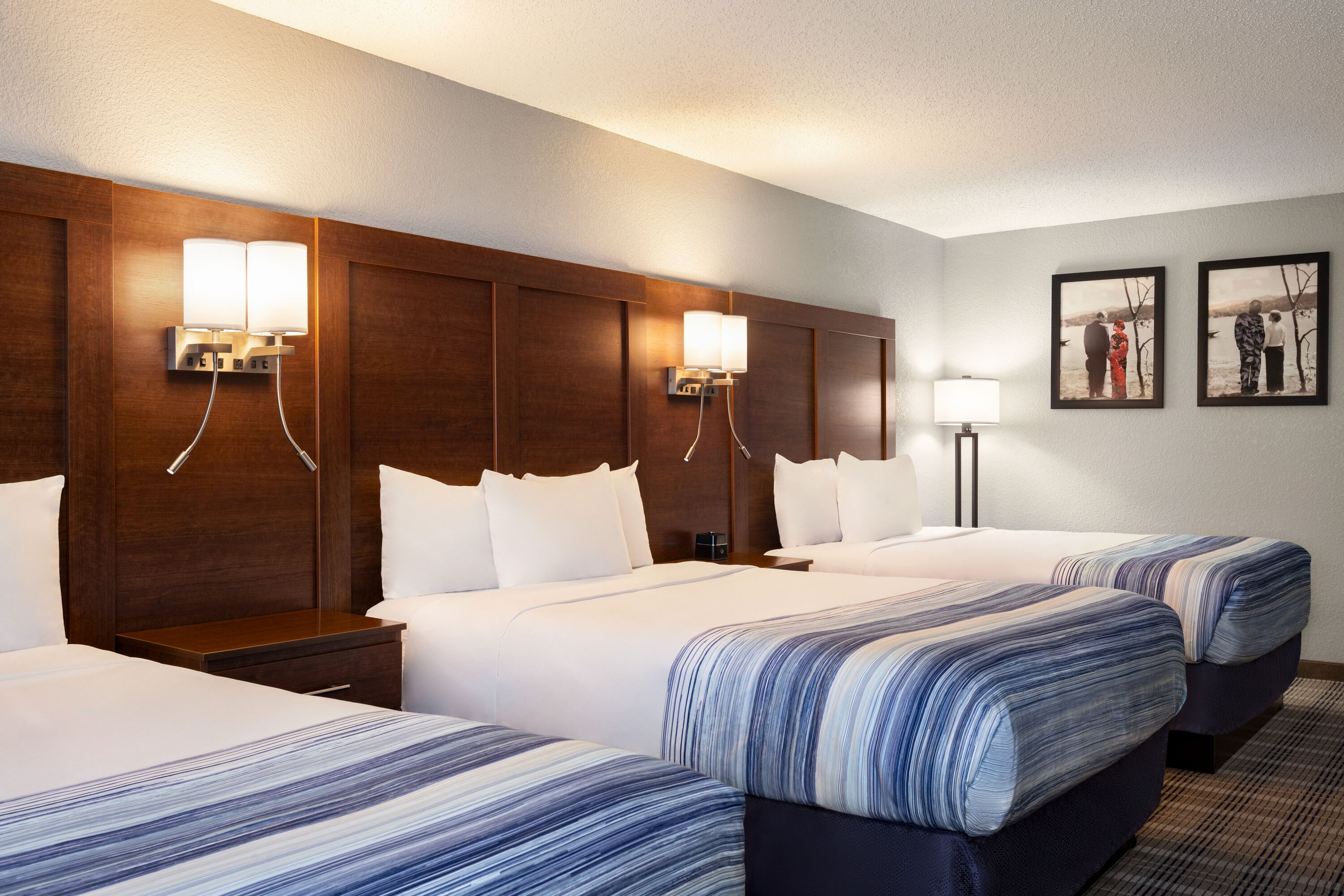 Guest room at the AmericInn by Wyndham Williamsburg in Williamsburg, Iowa