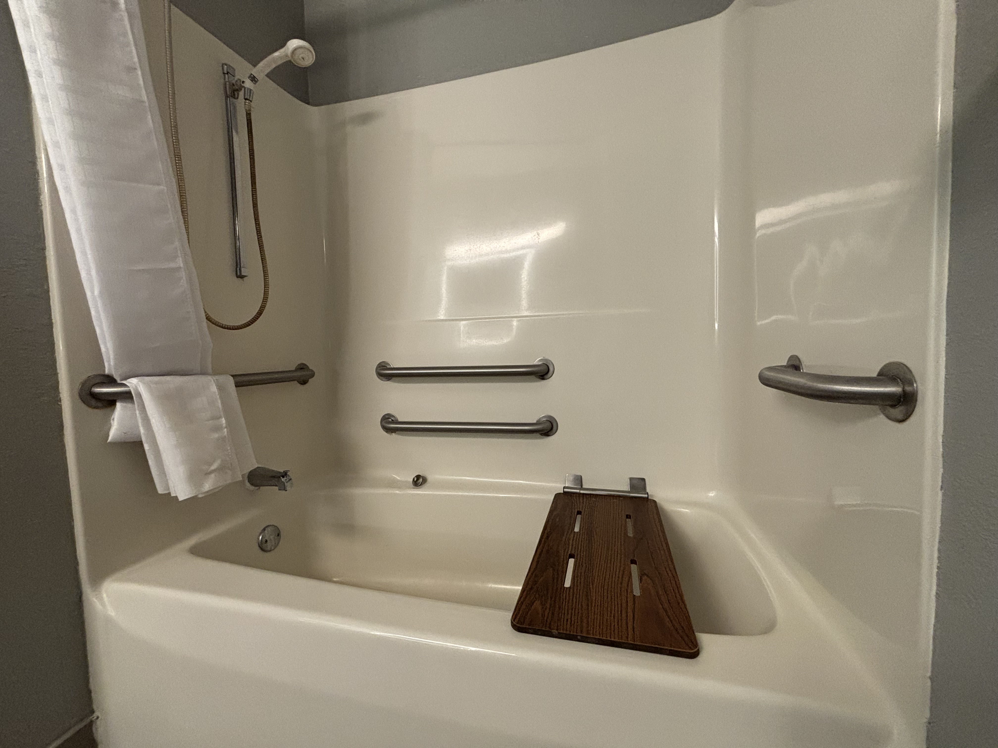 Guest room bath at the AmericInn by Wyndham Galesburg in Galesburg, Illinois