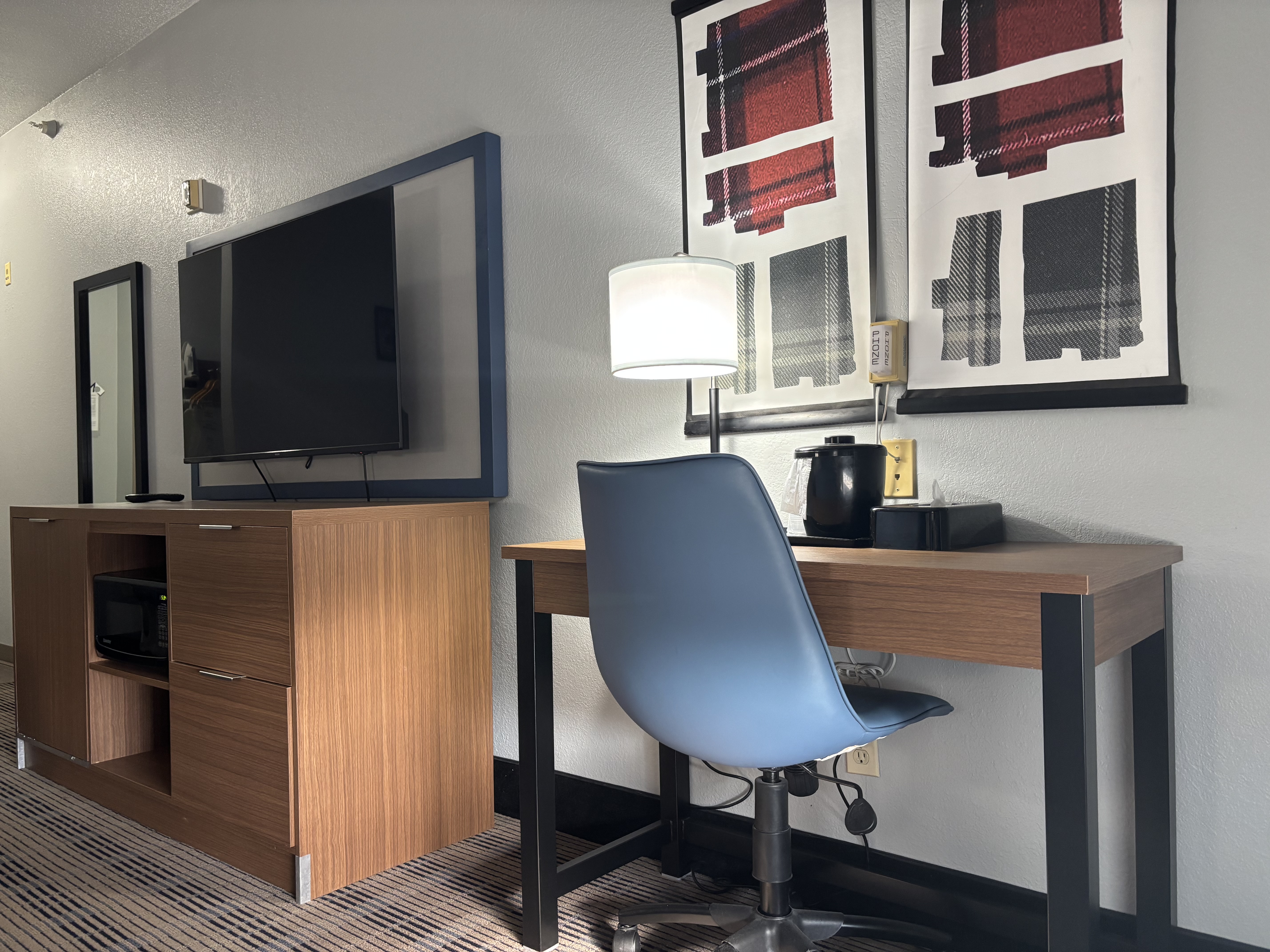Guest room at the AmericInn by Wyndham Galesburg in Galesburg, Illinois