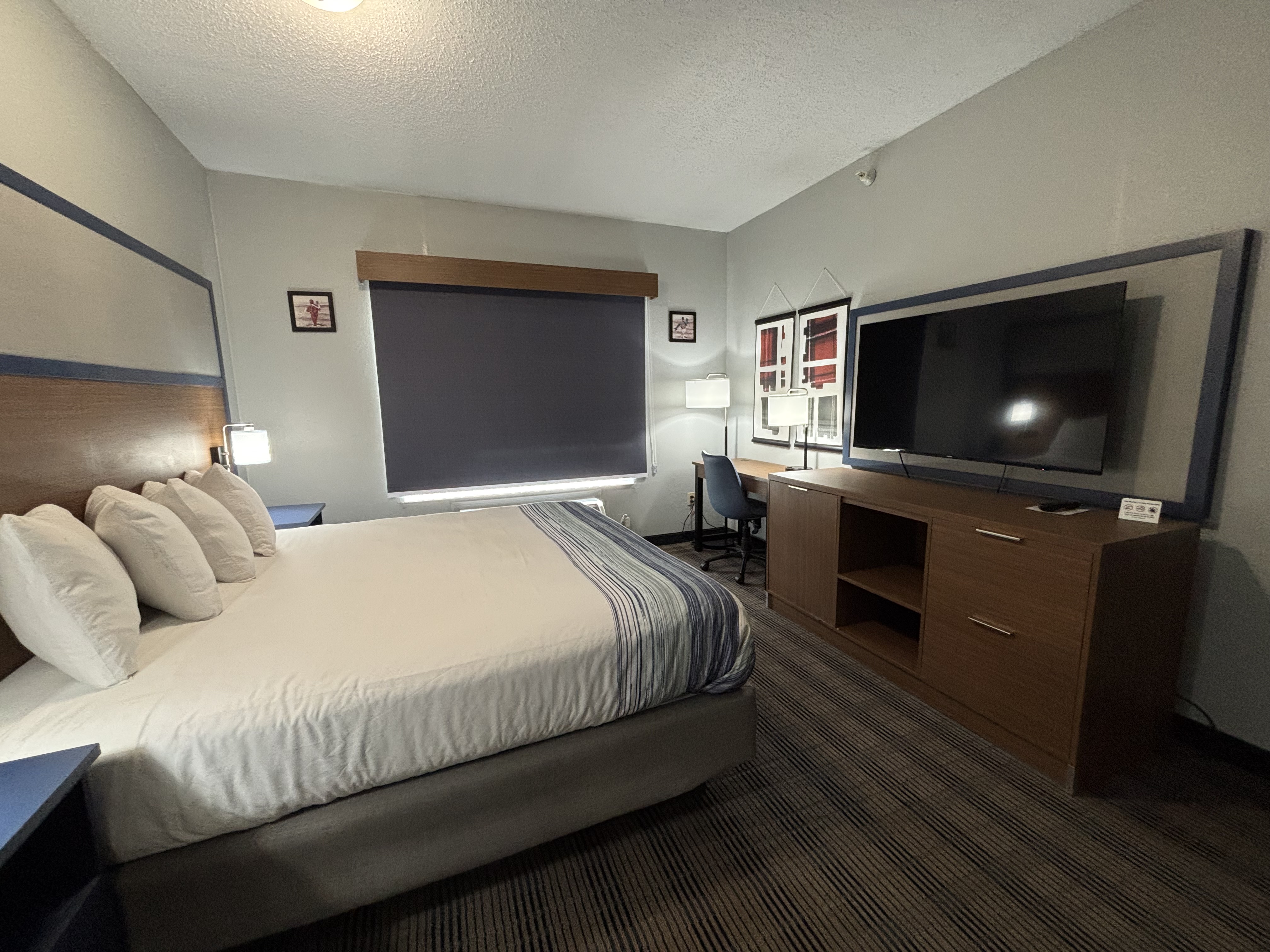 Guest room at the AmericInn by Wyndham Galesburg in Galesburg, Illinois