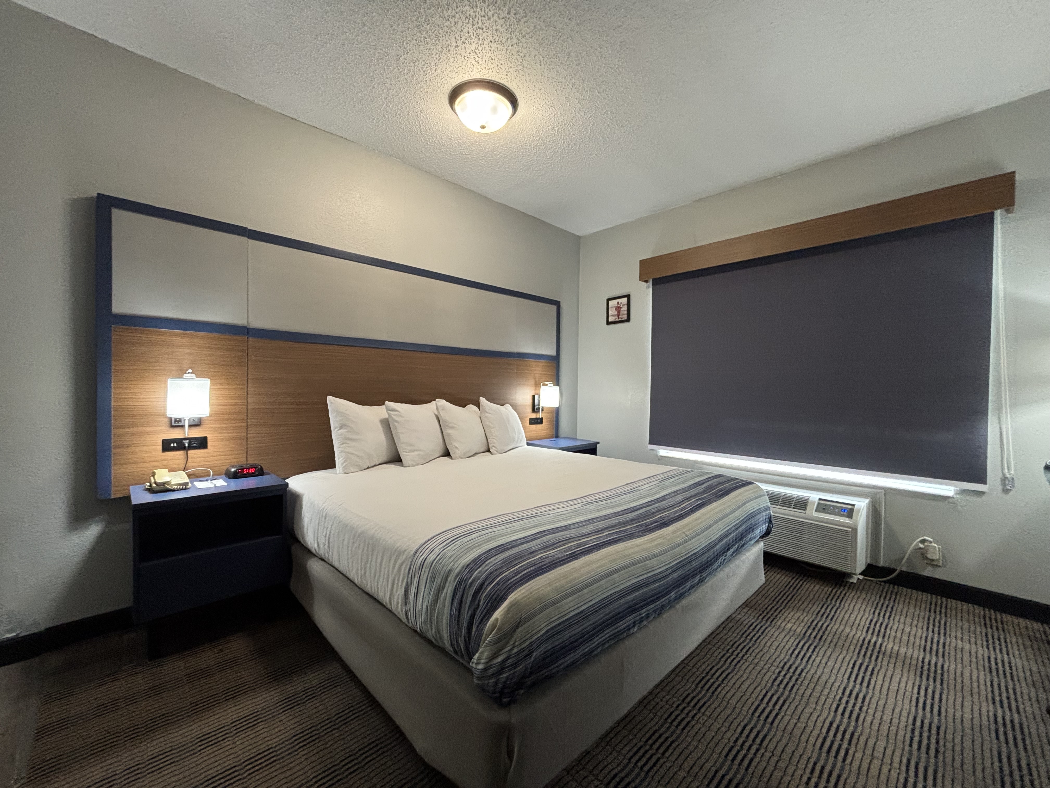 Guest room at the AmericInn by Wyndham Galesburg in Galesburg, Illinois