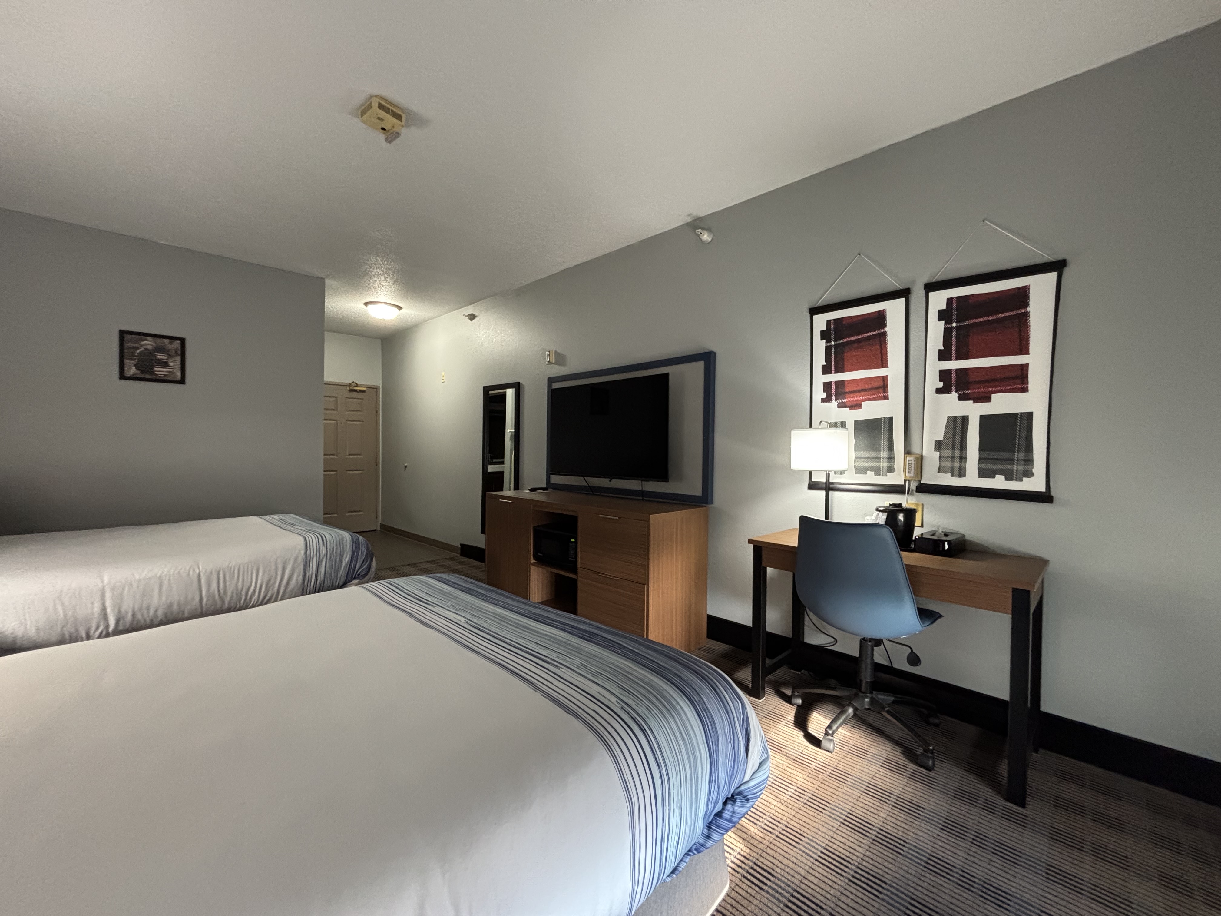 Guest room at the AmericInn by Wyndham Galesburg in Galesburg, Illinois