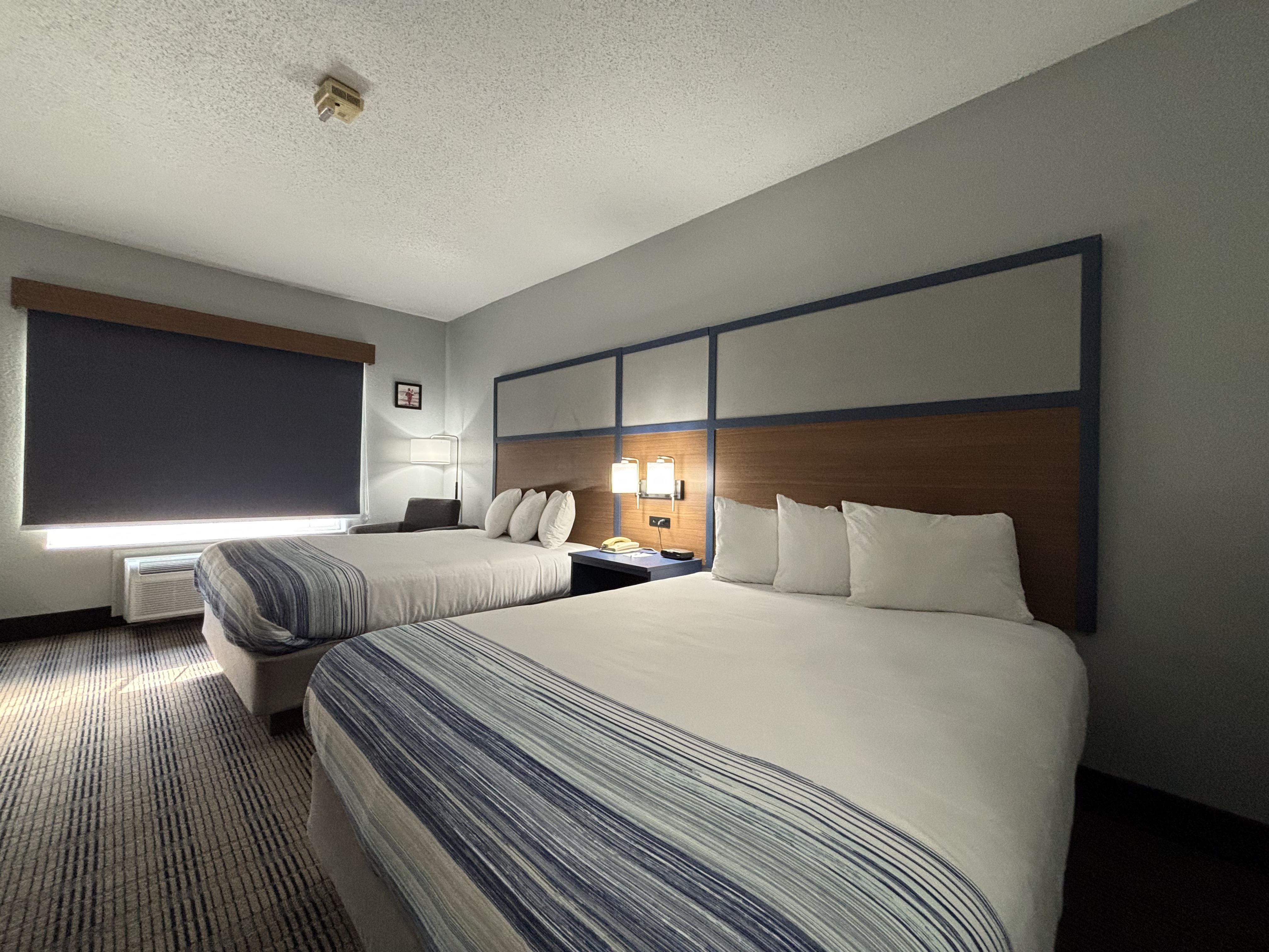 Guest room at the AmericInn by Wyndham Galesburg in Galesburg, Illinois