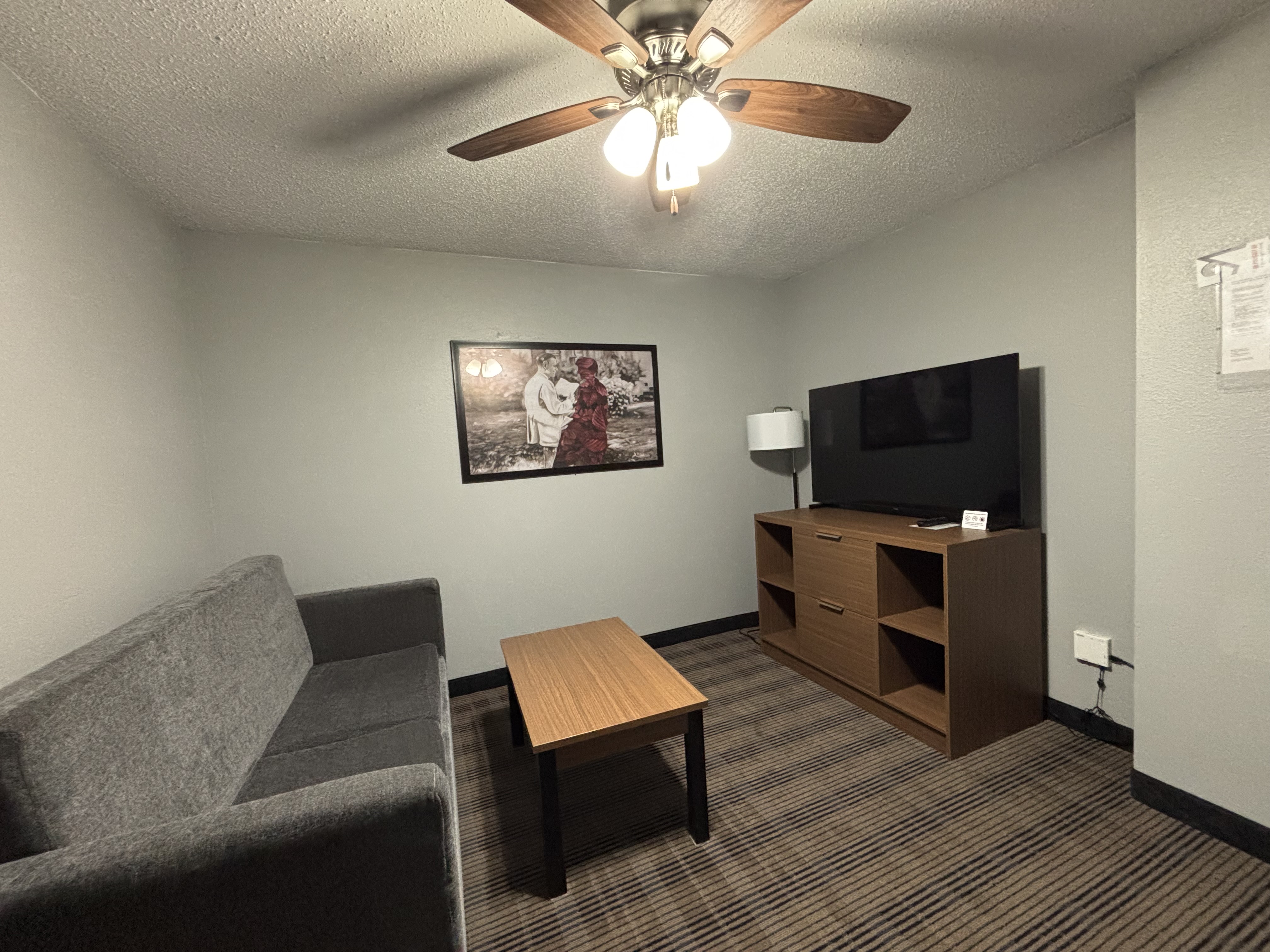 Guest room at the AmericInn by Wyndham Galesburg in Galesburg, Illinois