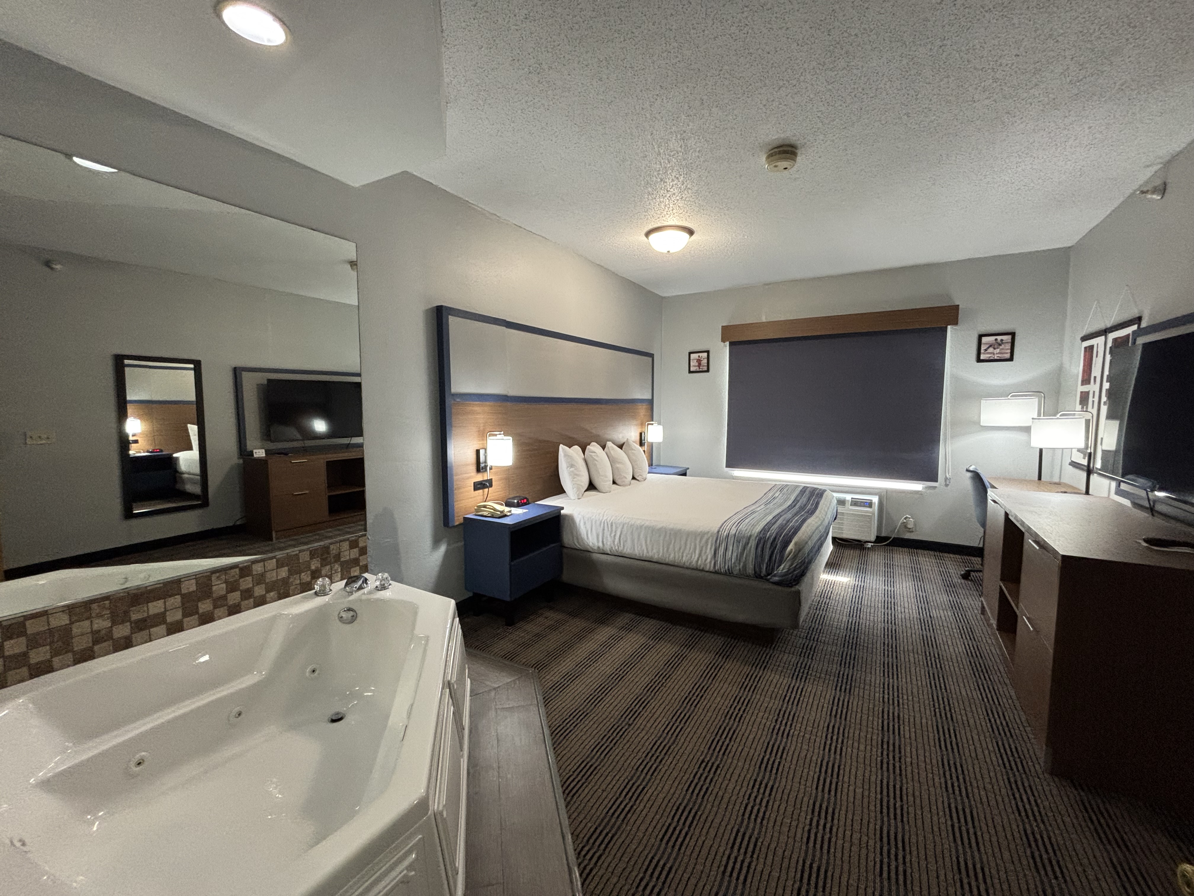 Guest room at the AmericInn by Wyndham Galesburg in Galesburg, Illinois