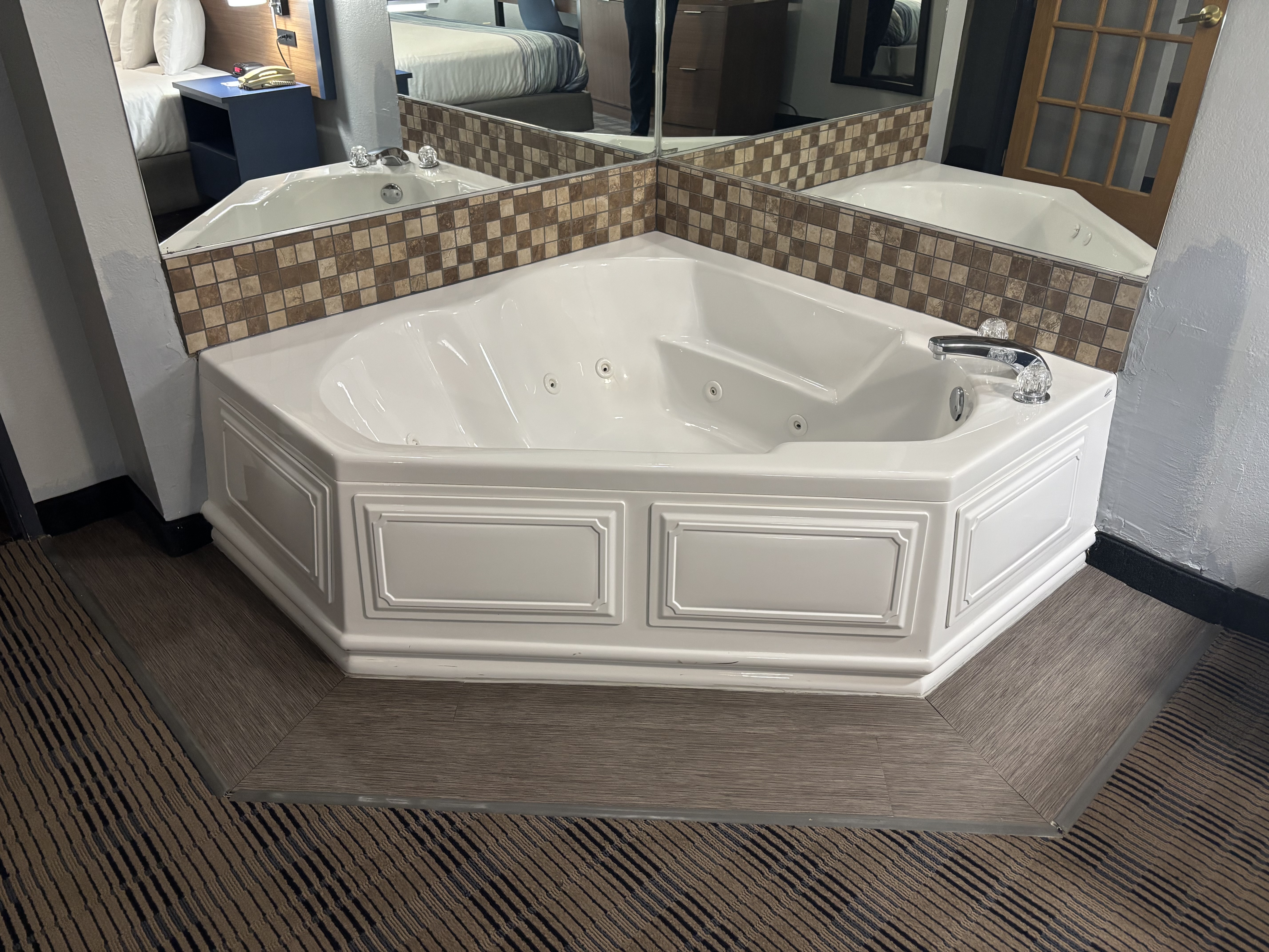 Guest room at the AmericInn by Wyndham Galesburg in Galesburg, Illinois