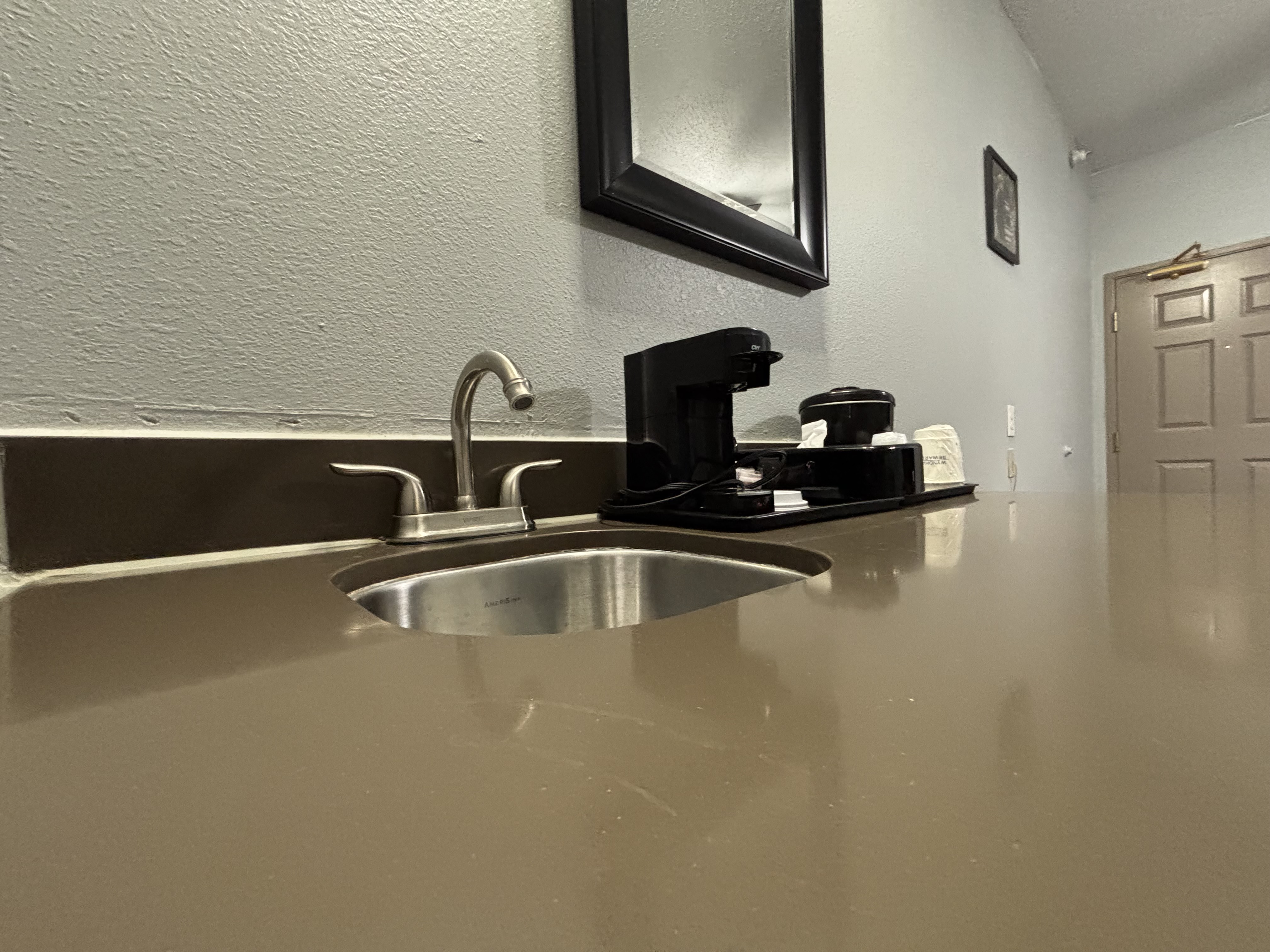 Guest room at the AmericInn by Wyndham Galesburg in Galesburg, Illinois