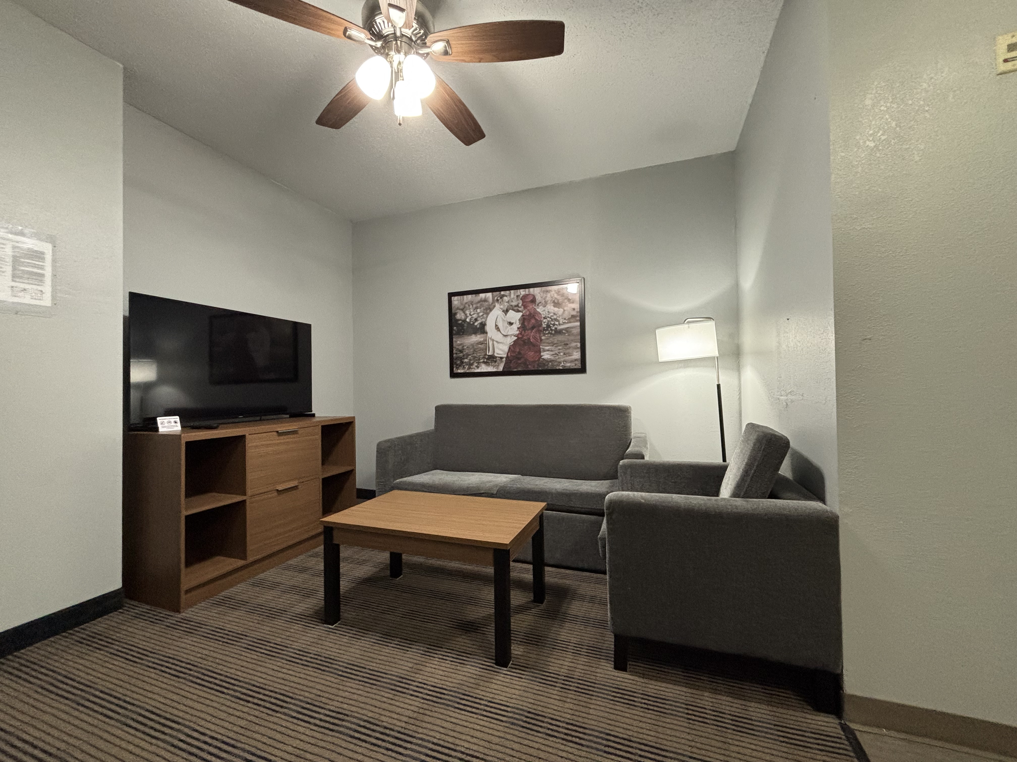 Guest room at the AmericInn by Wyndham Galesburg in Galesburg, Illinois