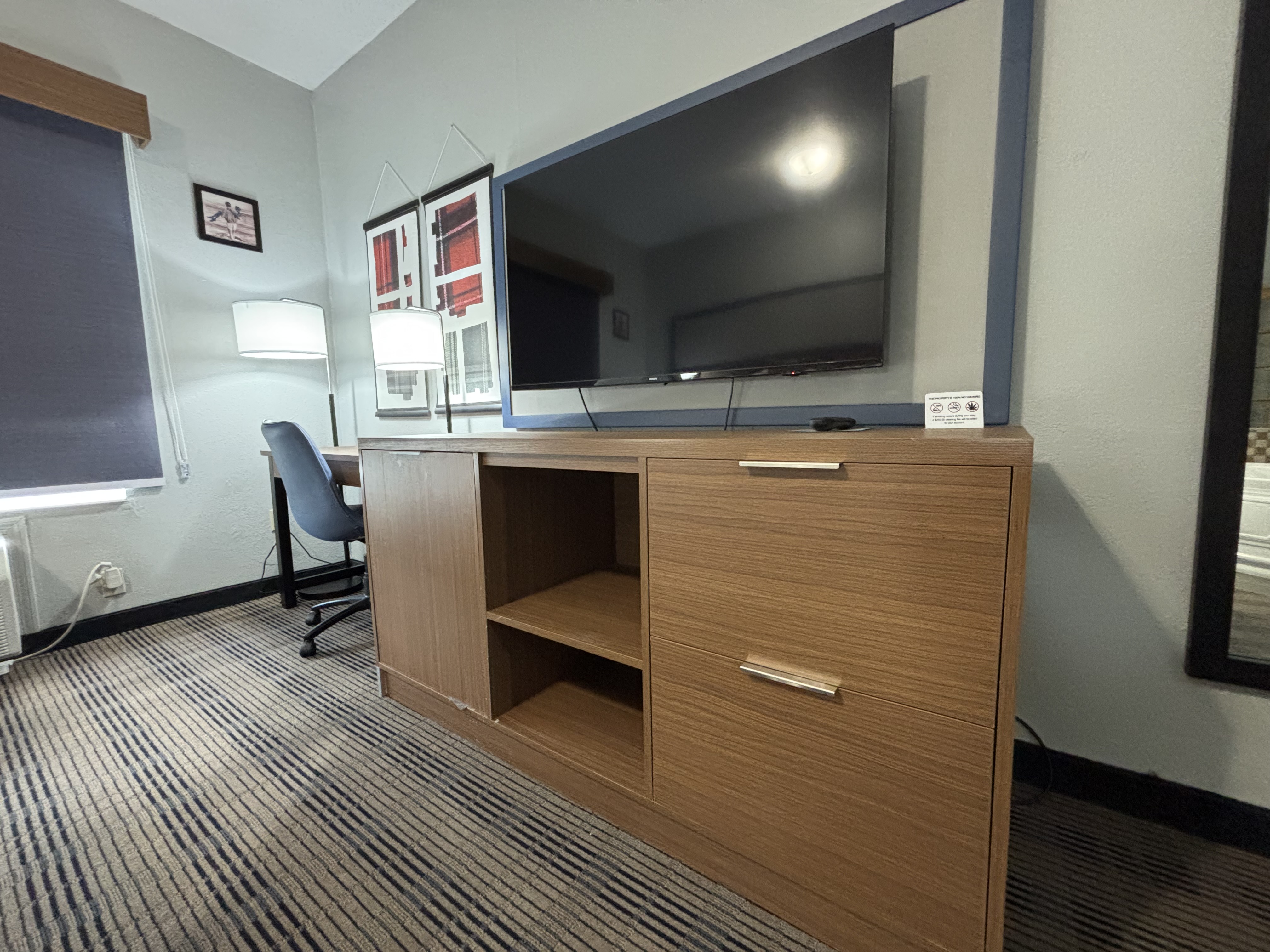 Guest room at the AmericInn by Wyndham Galesburg in Galesburg, Illinois