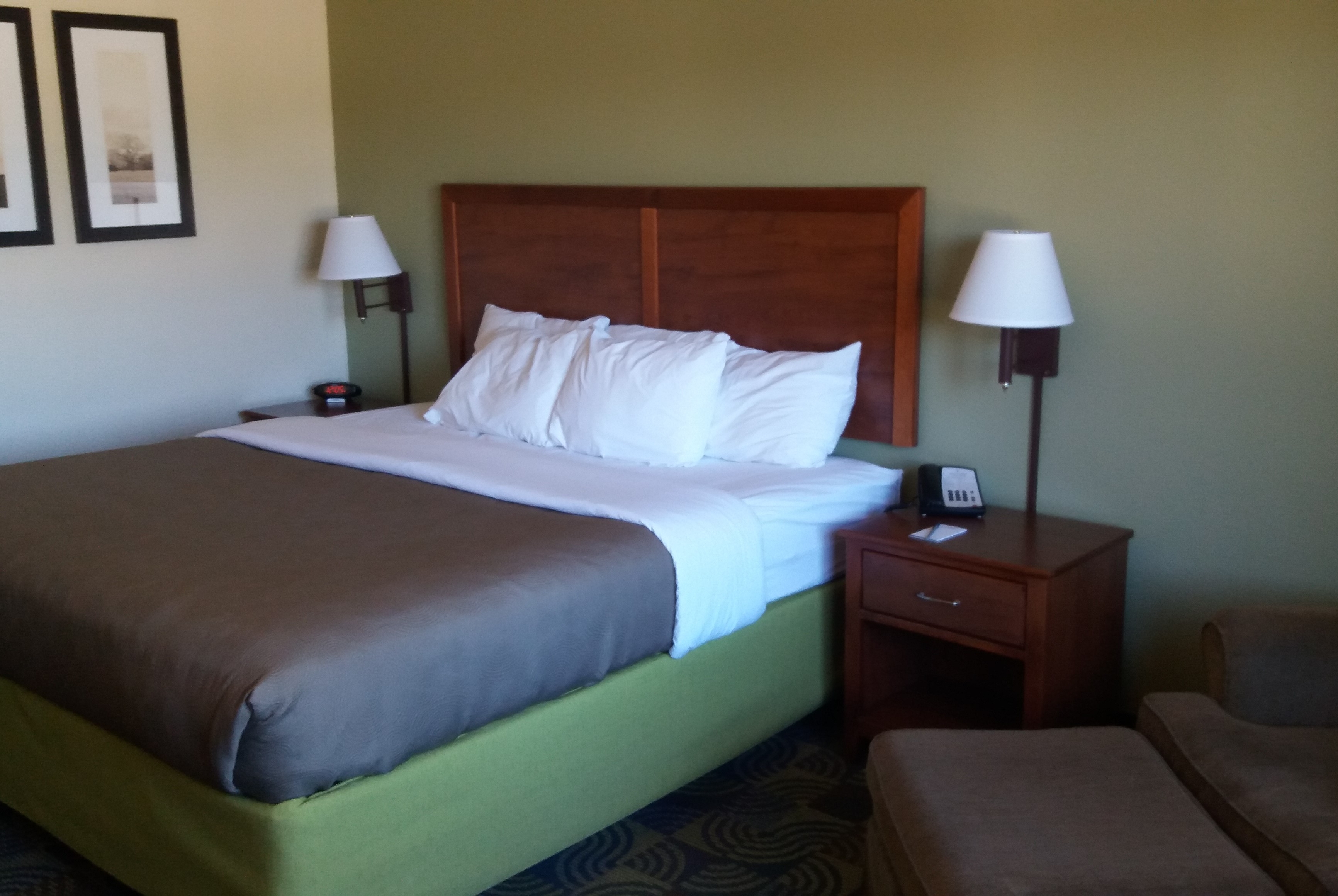 Guest room at the AmericInn by Wyndham Kewanee in Kewanee, Illinois