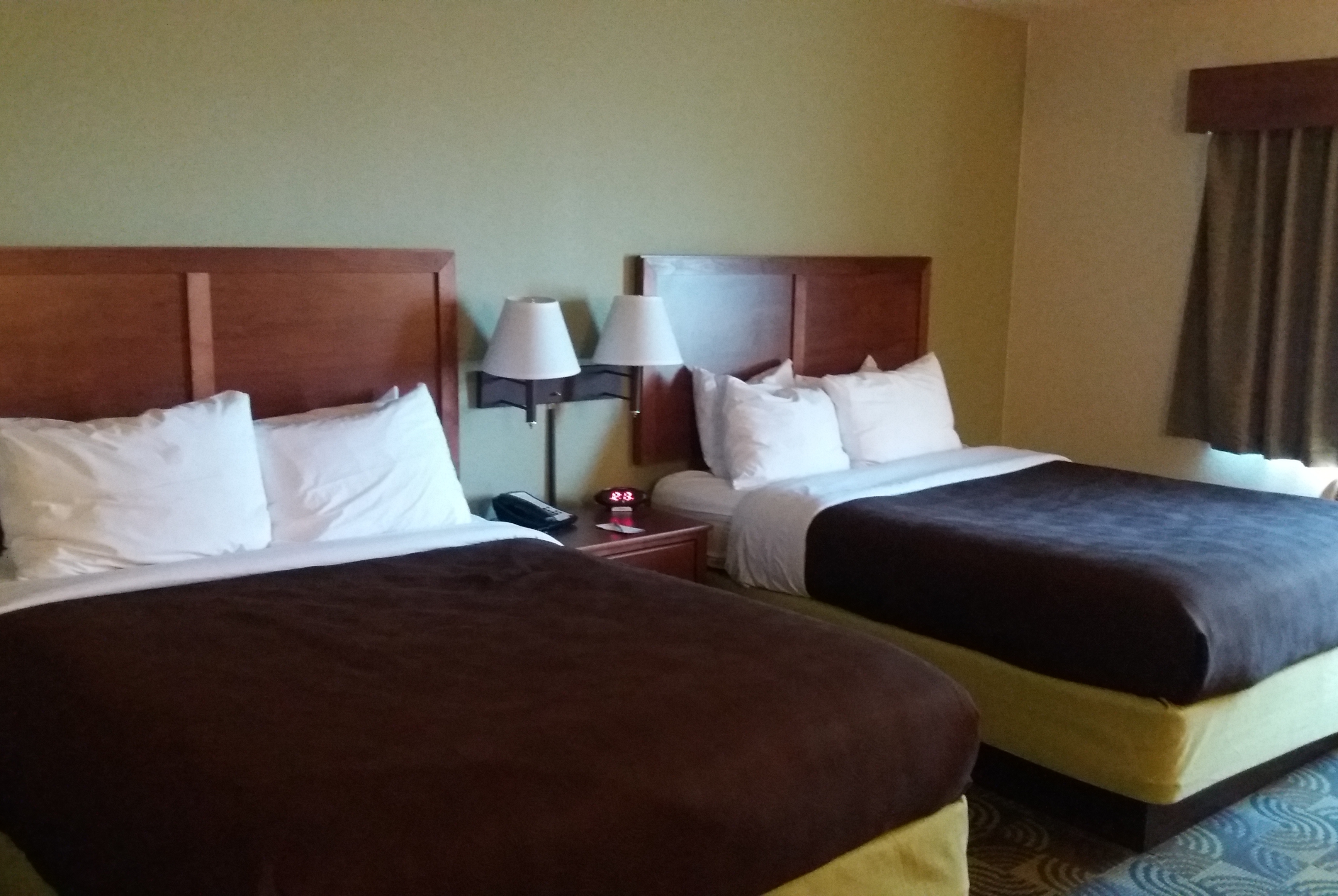 Guest room at the AmericInn by Wyndham Kewanee in Kewanee, Illinois