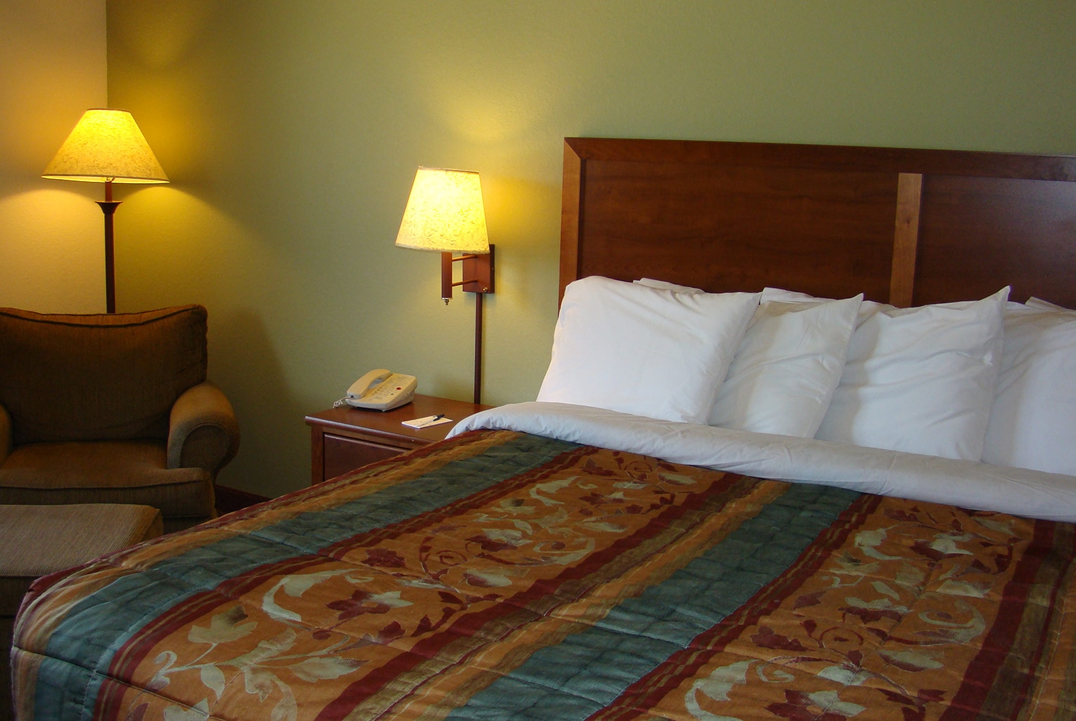 Guest room at the AmericInn by Wyndham Kewanee in Kewanee, Illinois