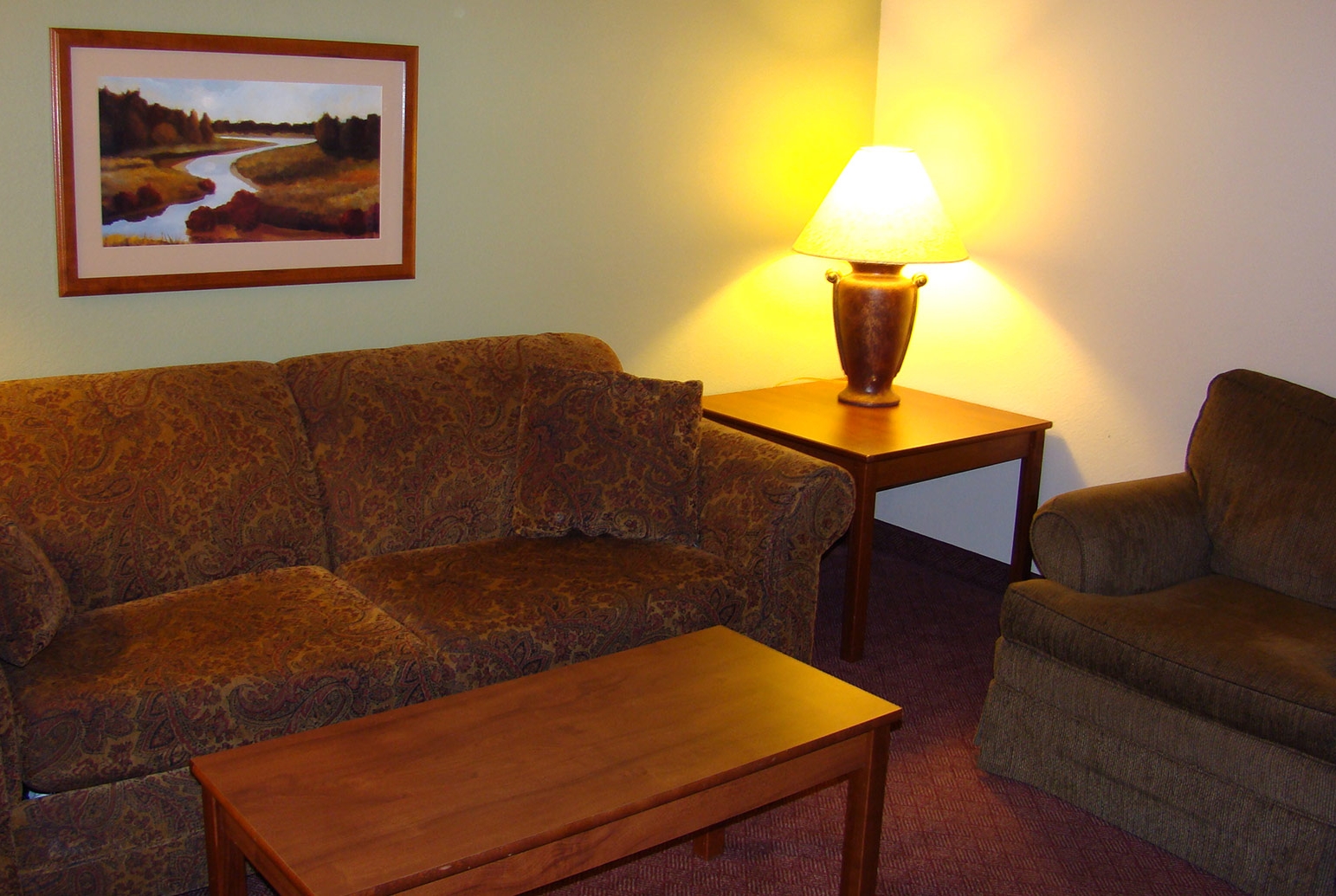 Guest room at the AmericInn by Wyndham Kewanee in Kewanee, Illinois