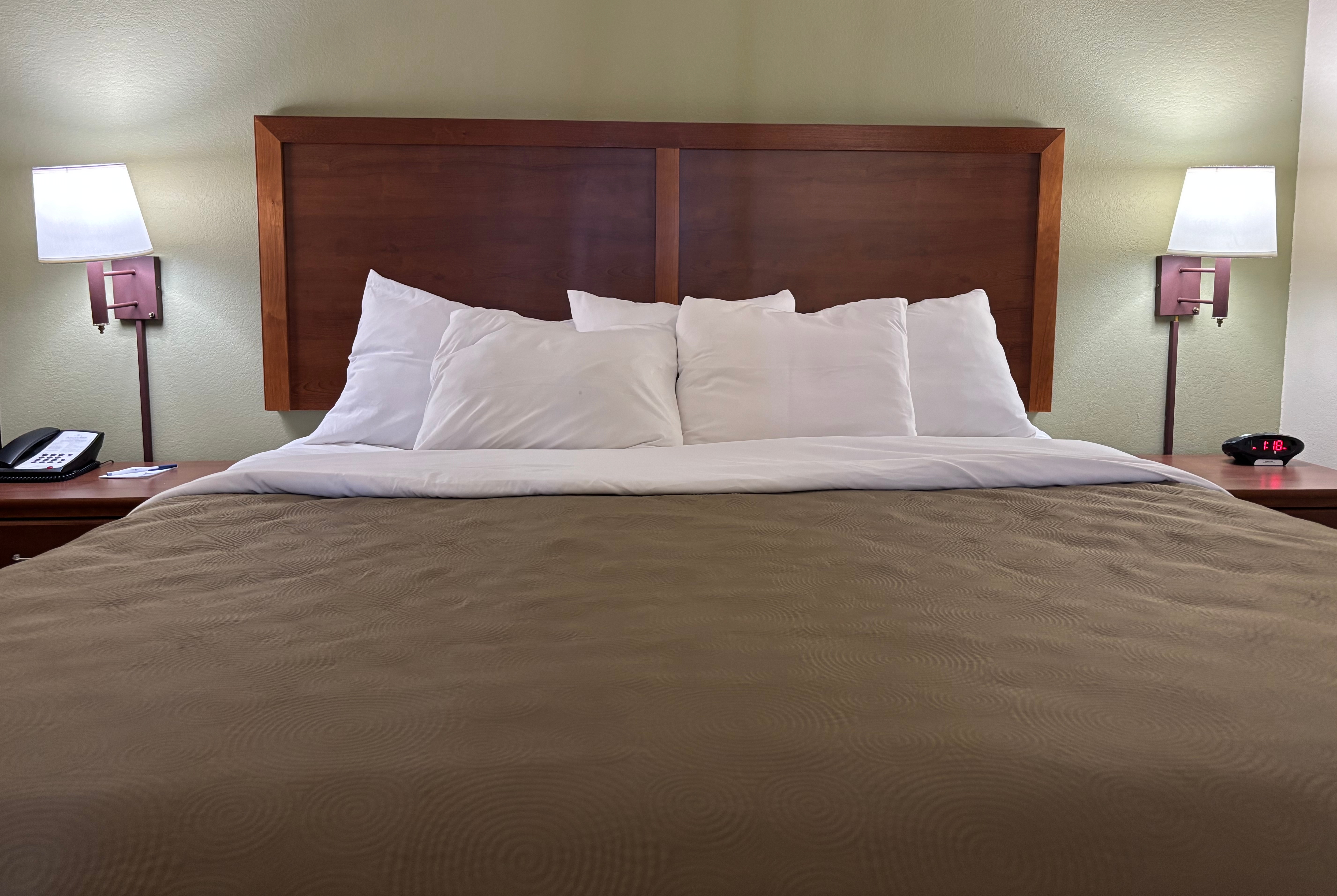 Guest room at the AmericInn by Wyndham Kewanee in Kewanee, Illinois