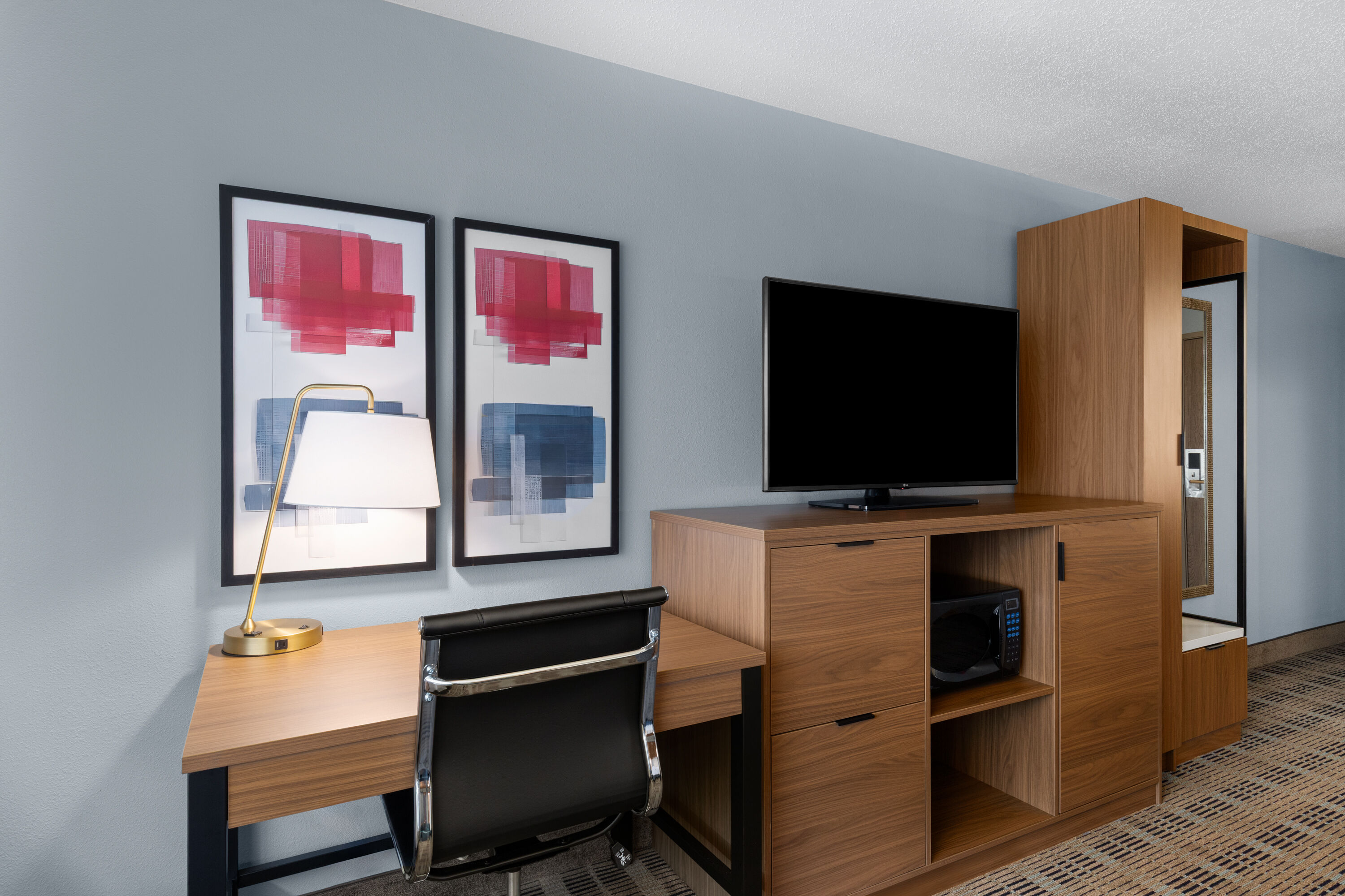 Guest room at the AmericInn by Wyndham Monmouth in Monmouth, Illinois