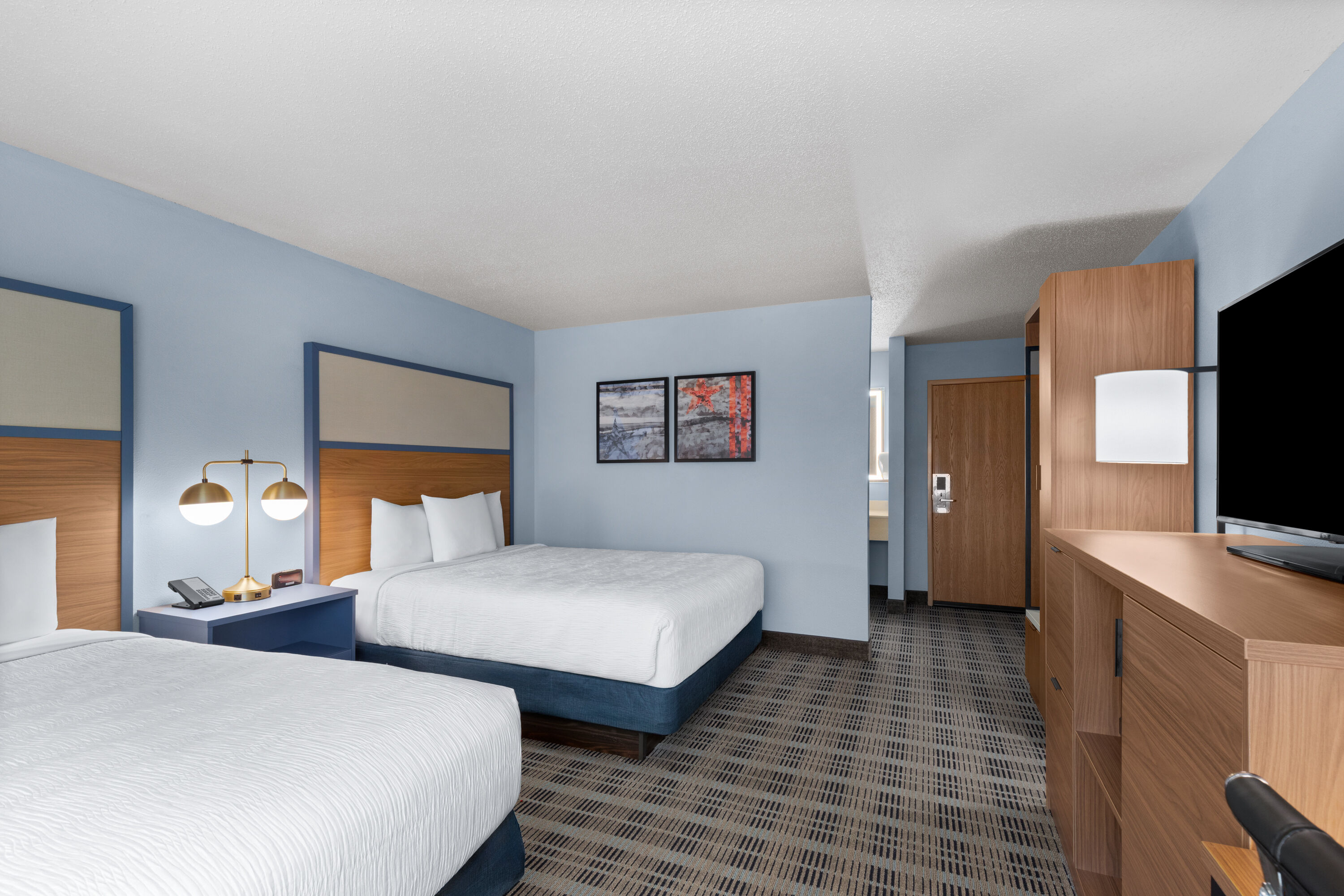 Guest room at the AmericInn by Wyndham Monmouth in Monmouth, Illinois
