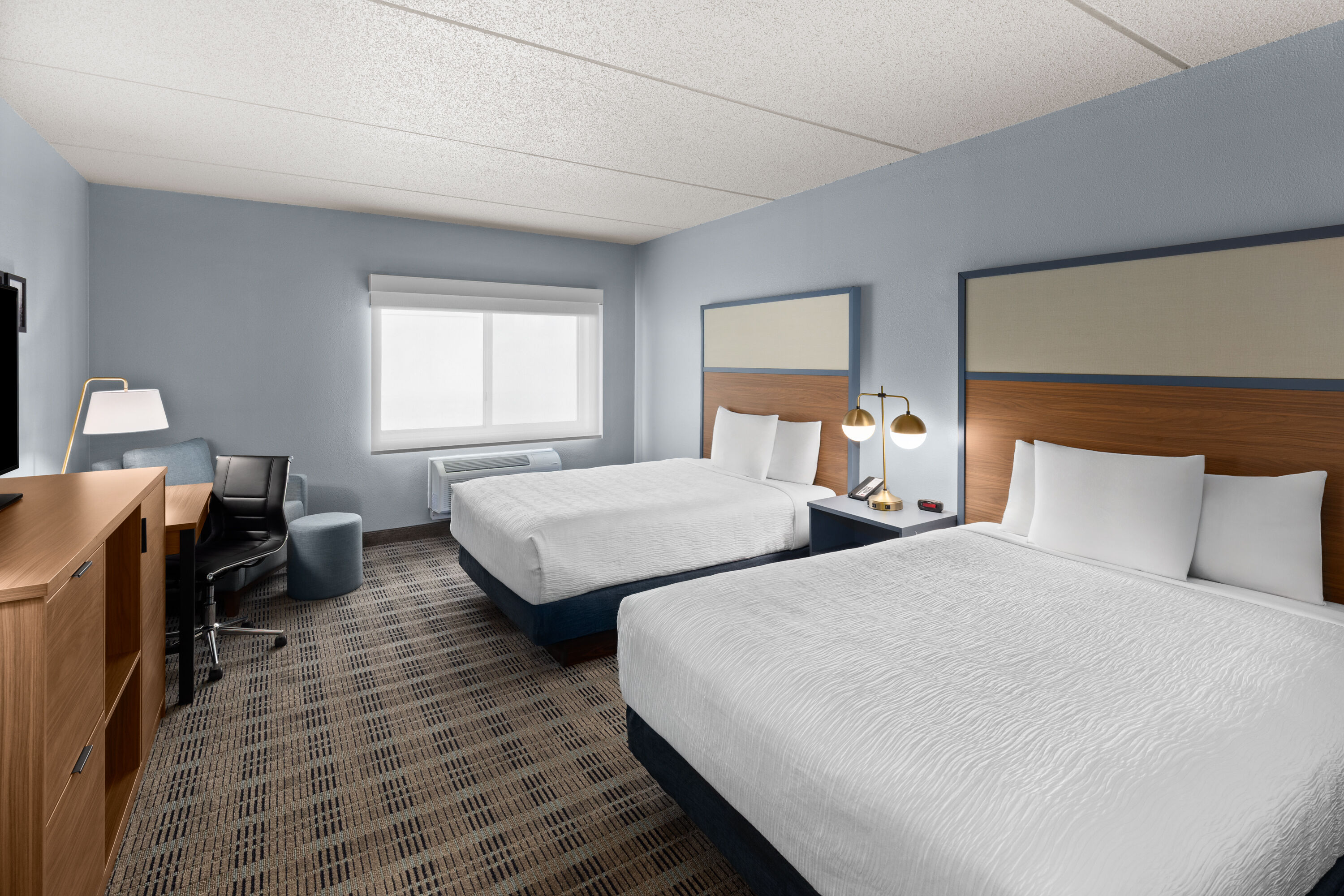 Guest room at the AmericInn by Wyndham Monmouth in Monmouth, Illinois
