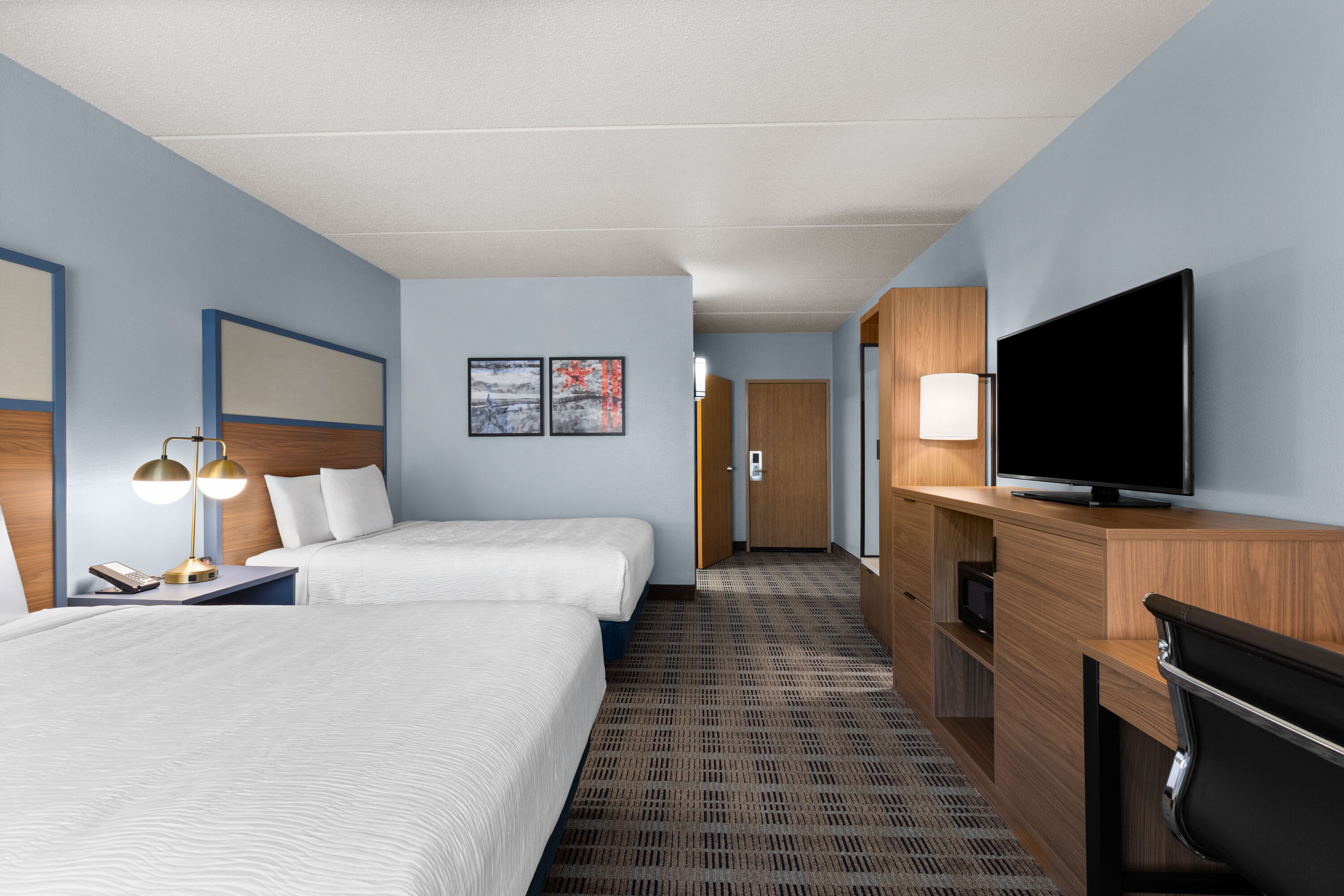 Guest room at the AmericInn by Wyndham Monmouth in Monmouth, Illinois