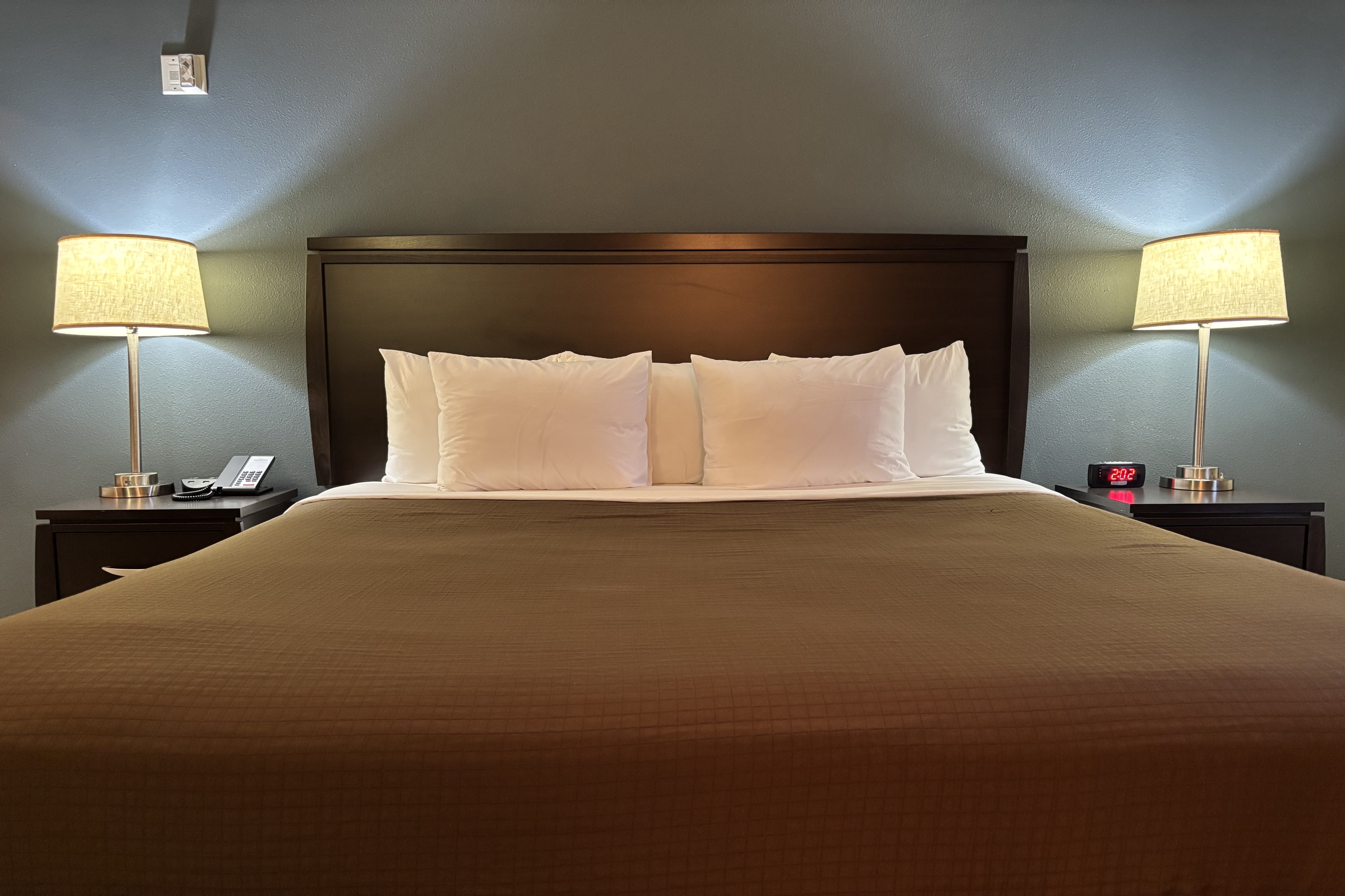 Guest room at the AmericInn by Wyndham Monmouth in Monmouth, Illinois