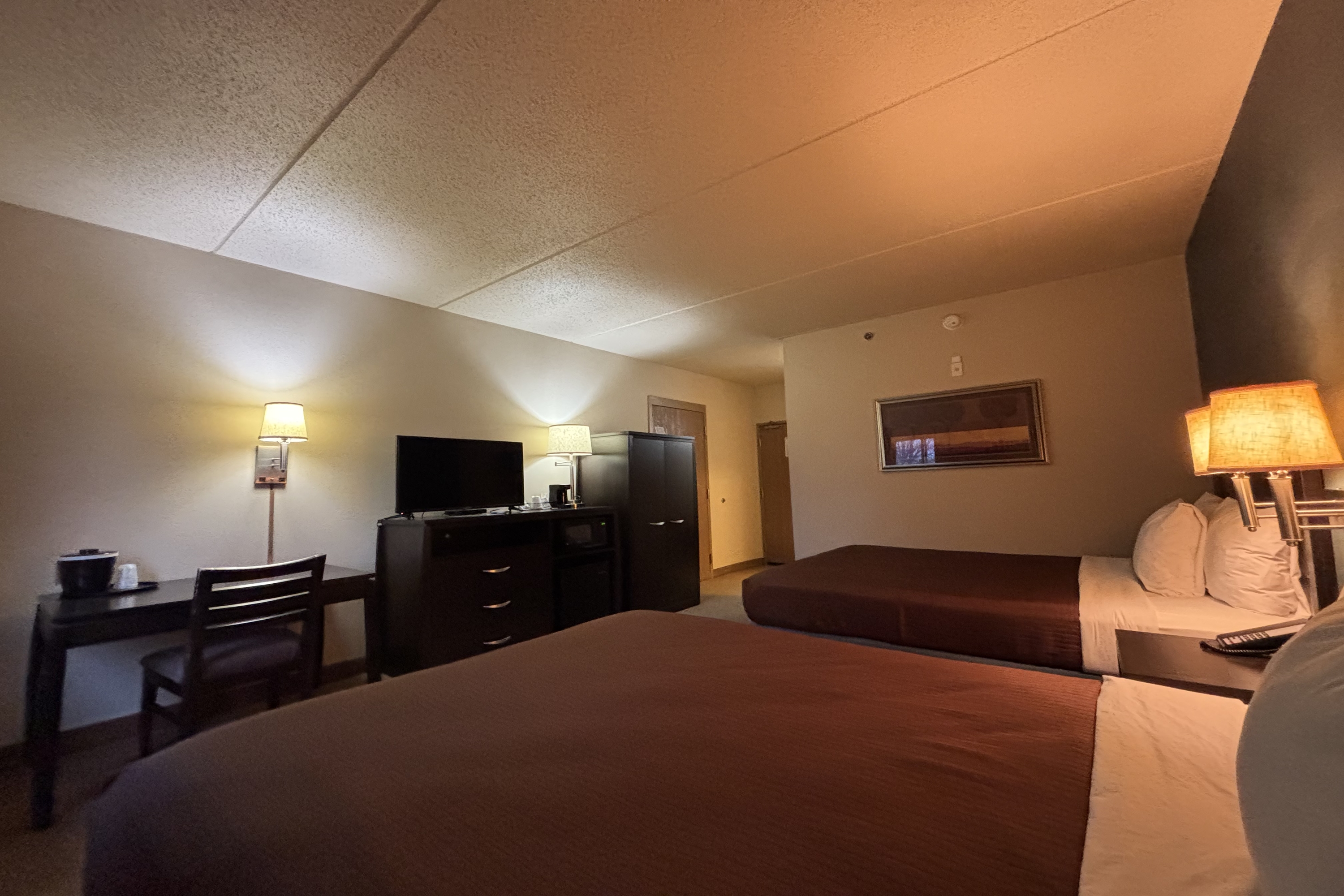 Guest room at the AmericInn by Wyndham Monmouth in Monmouth, Illinois