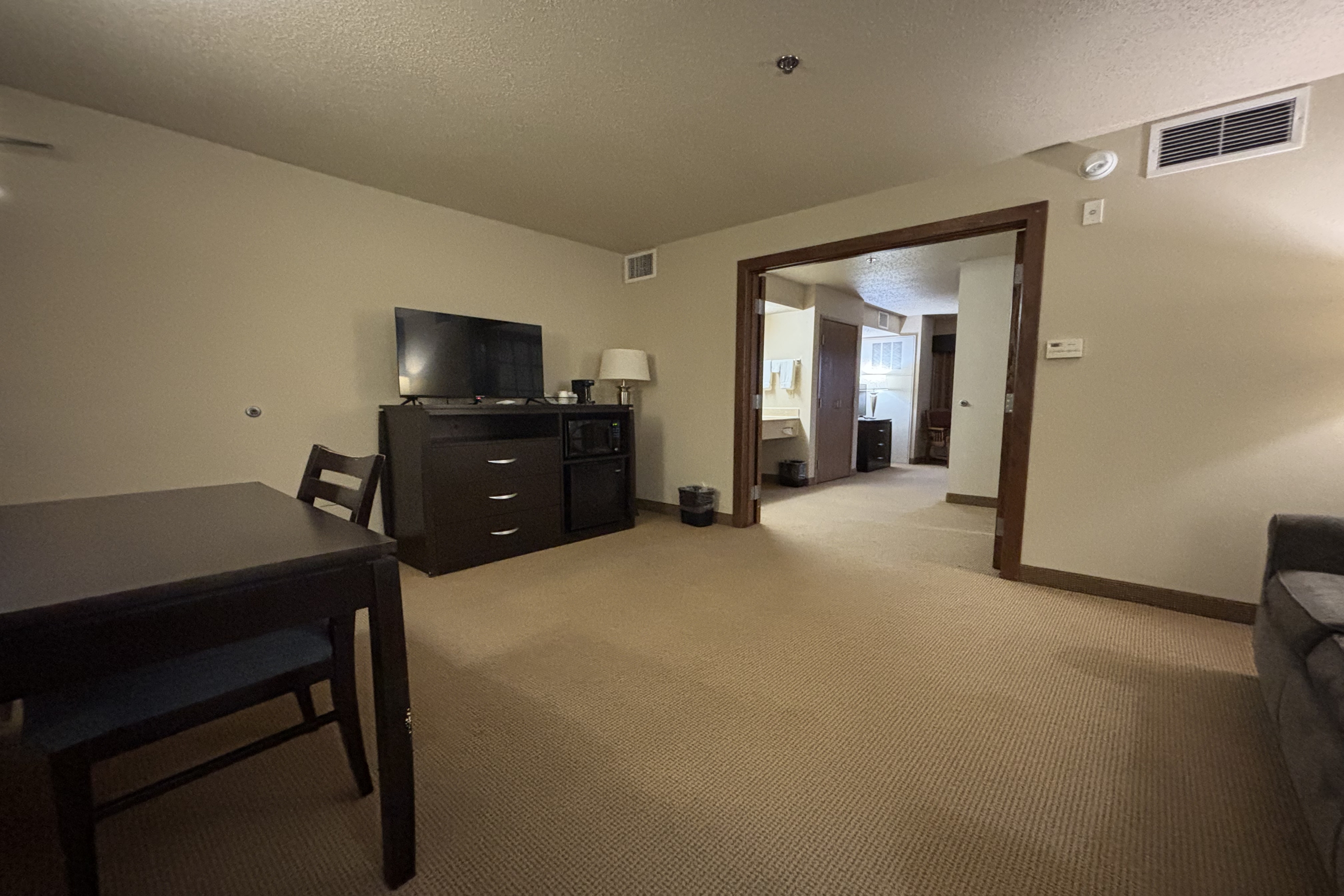 Guest room at the AmericInn by Wyndham Monmouth in Monmouth, Illinois