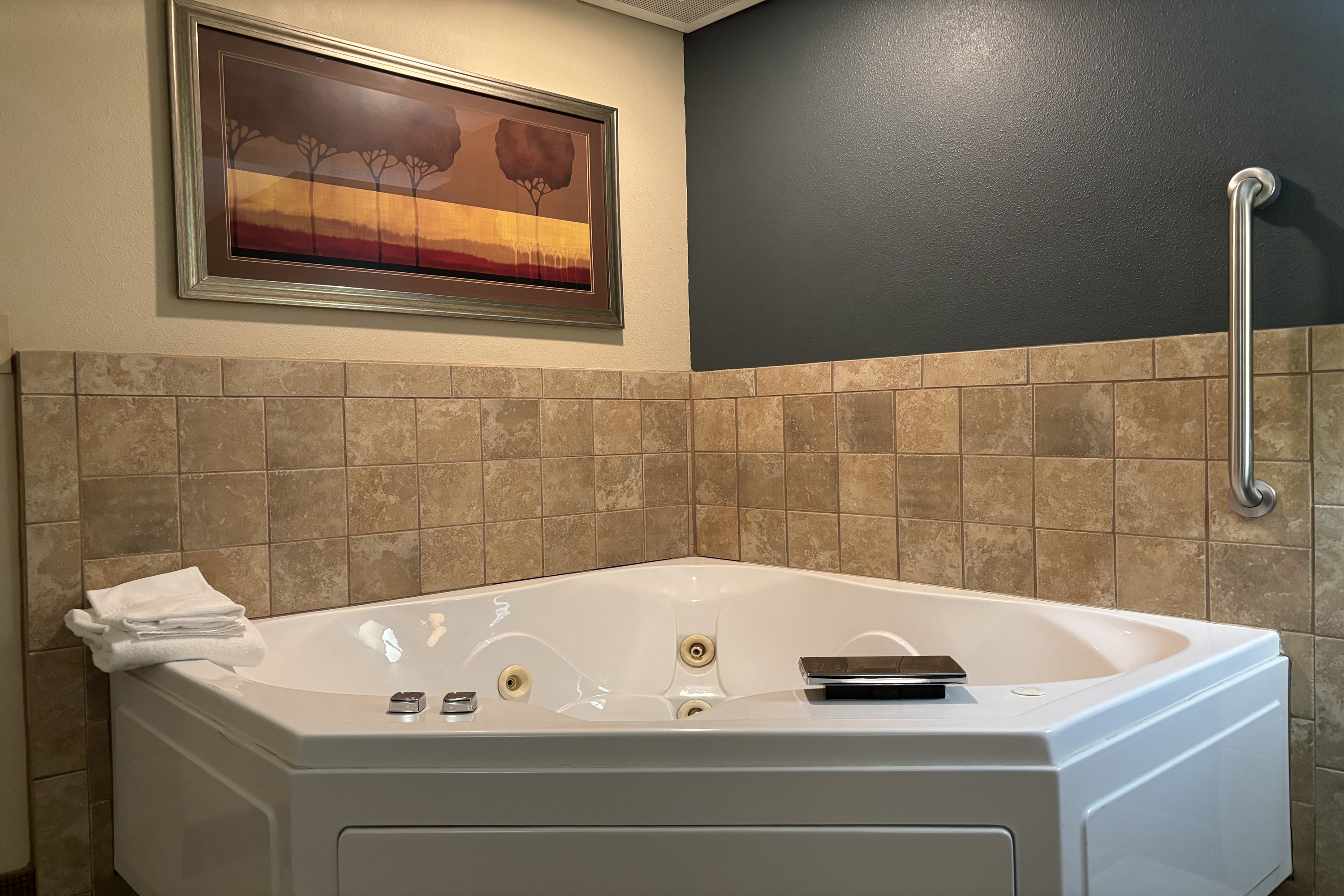 Guest room at the AmericInn by Wyndham Monmouth in Monmouth, Illinois