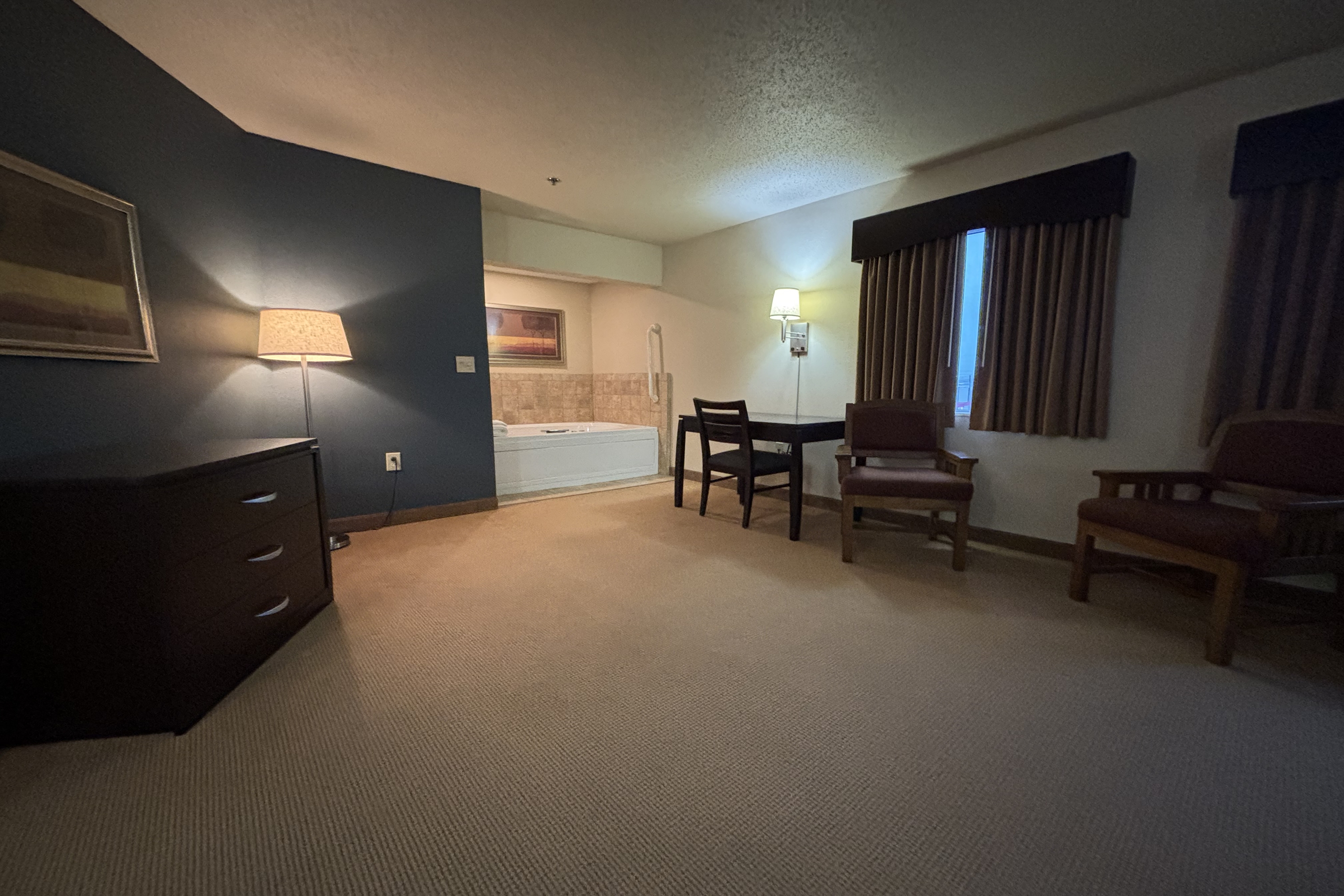 Guest room at the AmericInn by Wyndham Monmouth in Monmouth, Illinois