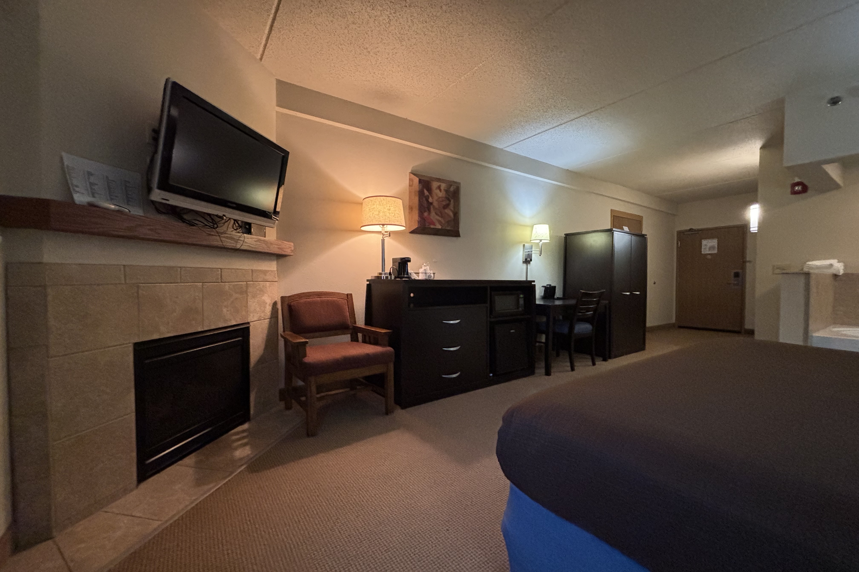 Guest room at the AmericInn by Wyndham Monmouth in Monmouth, Illinois
