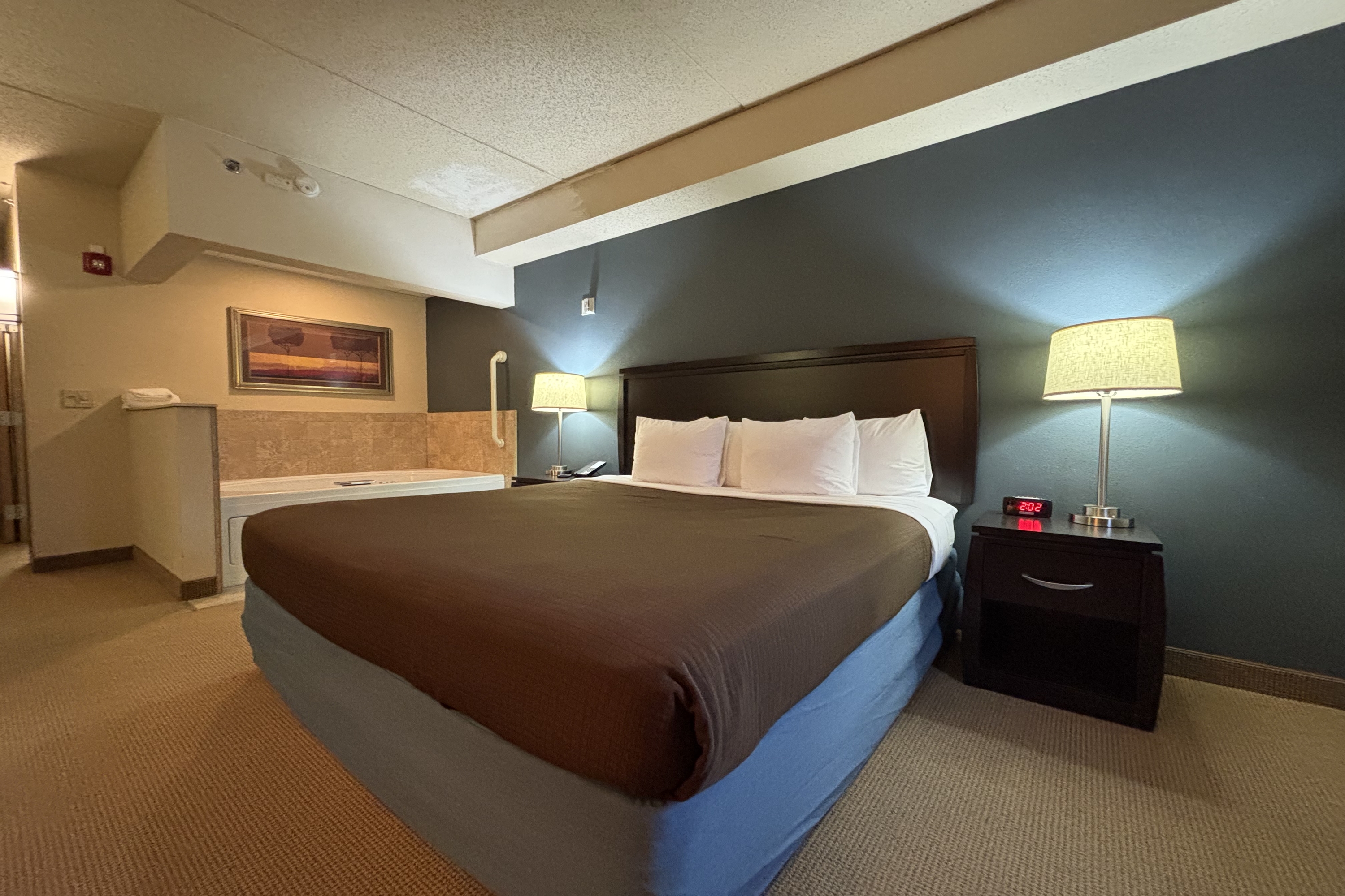 Guest room at the AmericInn by Wyndham Monmouth in Monmouth, Illinois