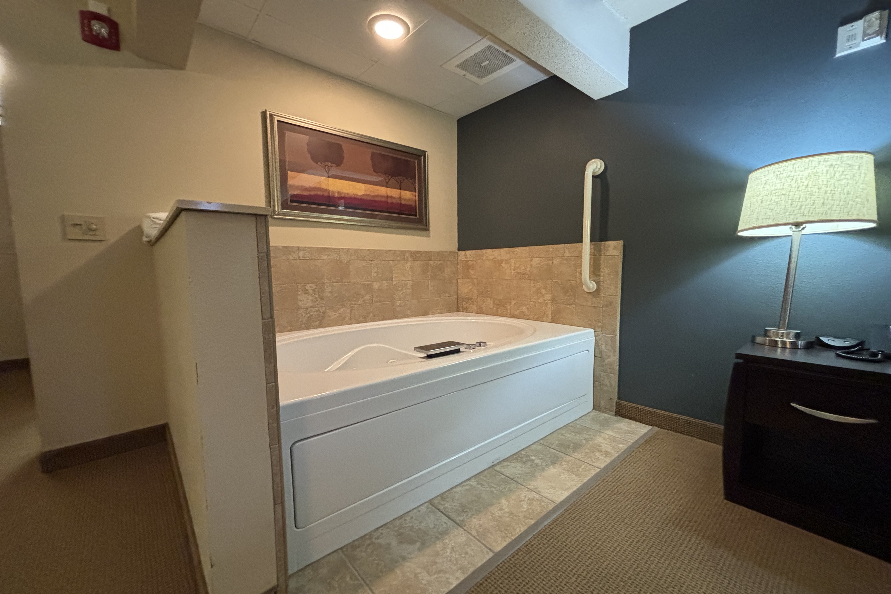 Guest room at the AmericInn by Wyndham Monmouth in Monmouth, Illinois