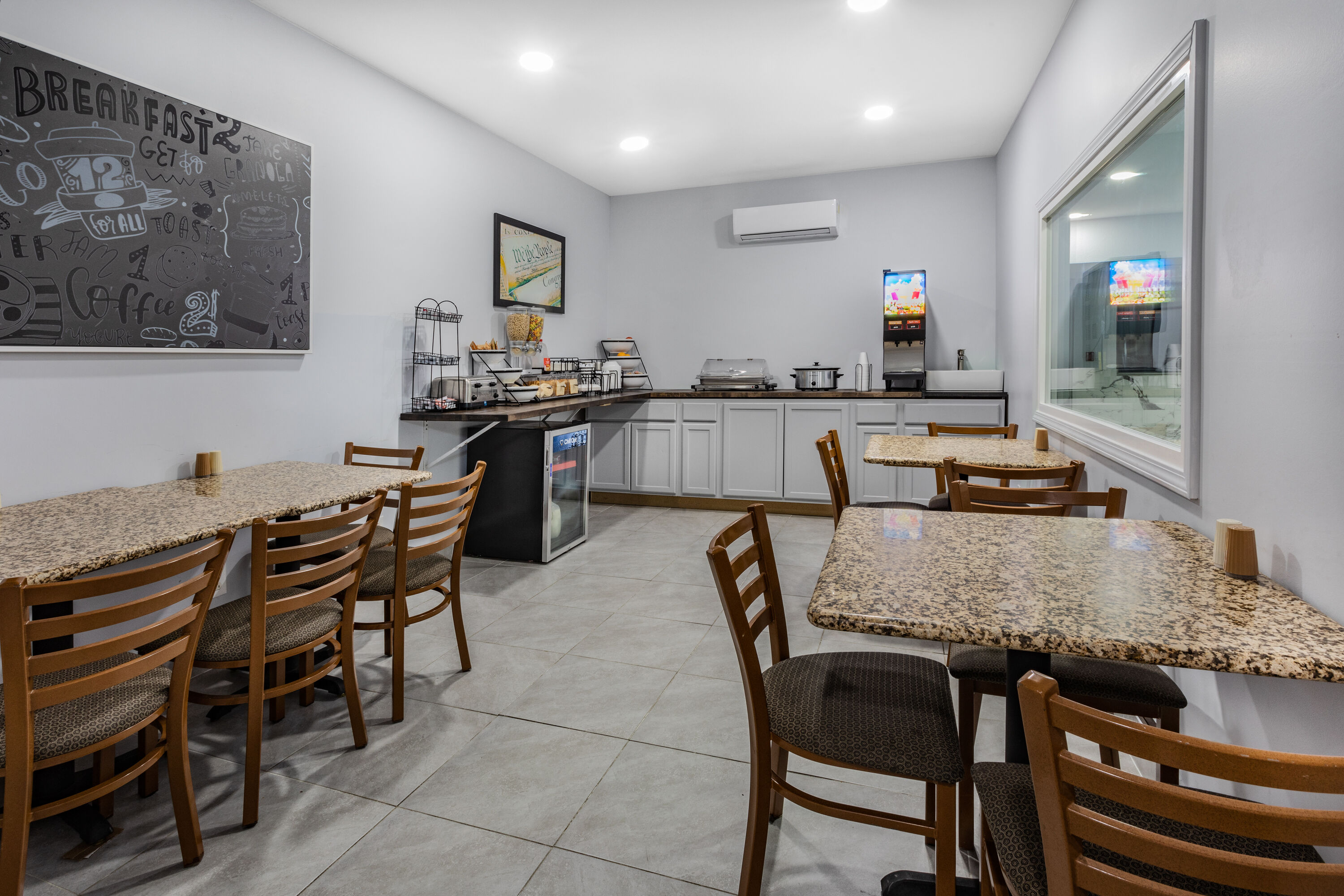 AmericInn by Wyndham Quincy restaurant breakfast area with seating in Quincy, Illinois