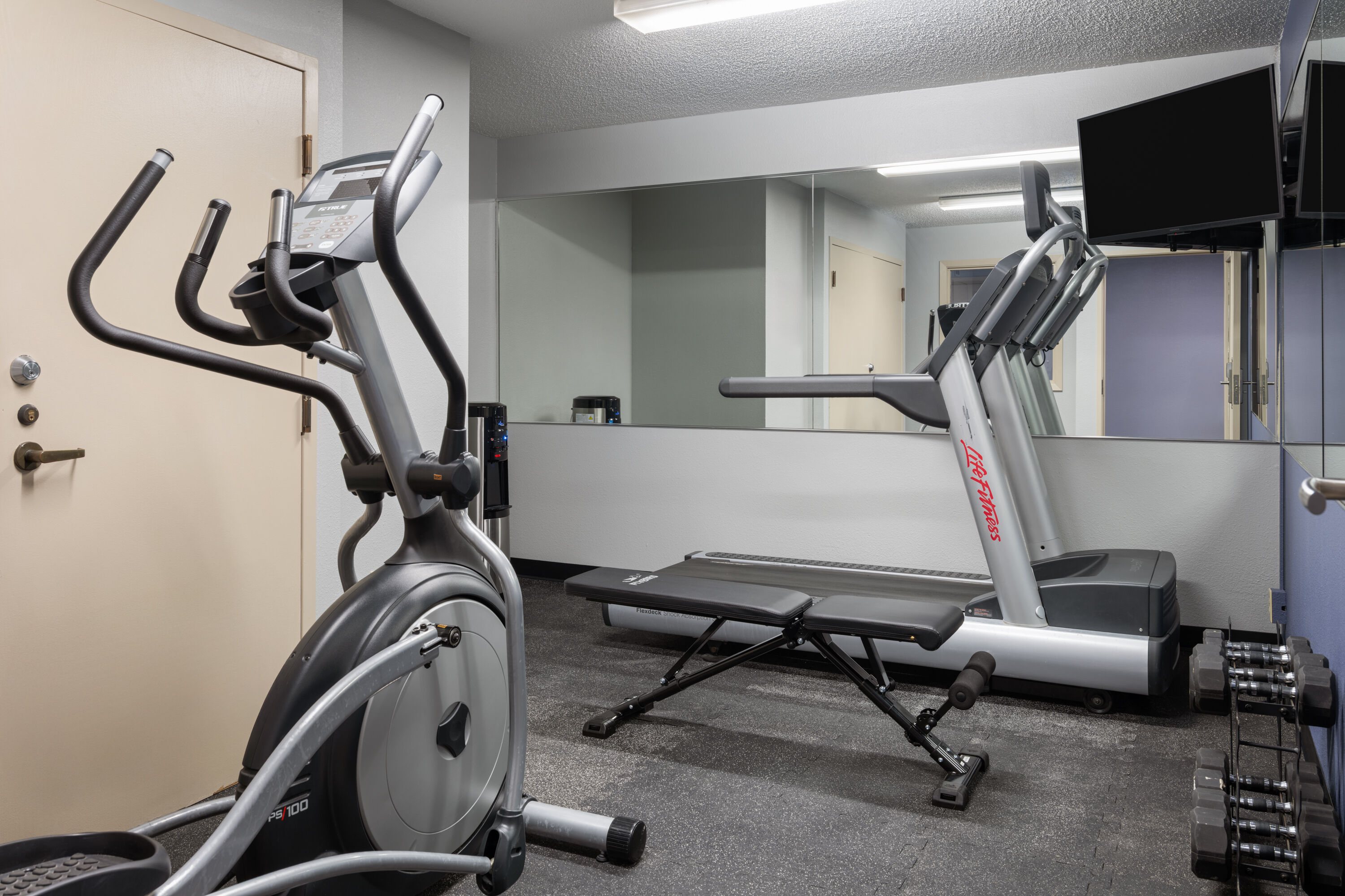 Fitness room at AmericInn by Wyndham Urbana/Champaign University Area in Urbana, Illinois