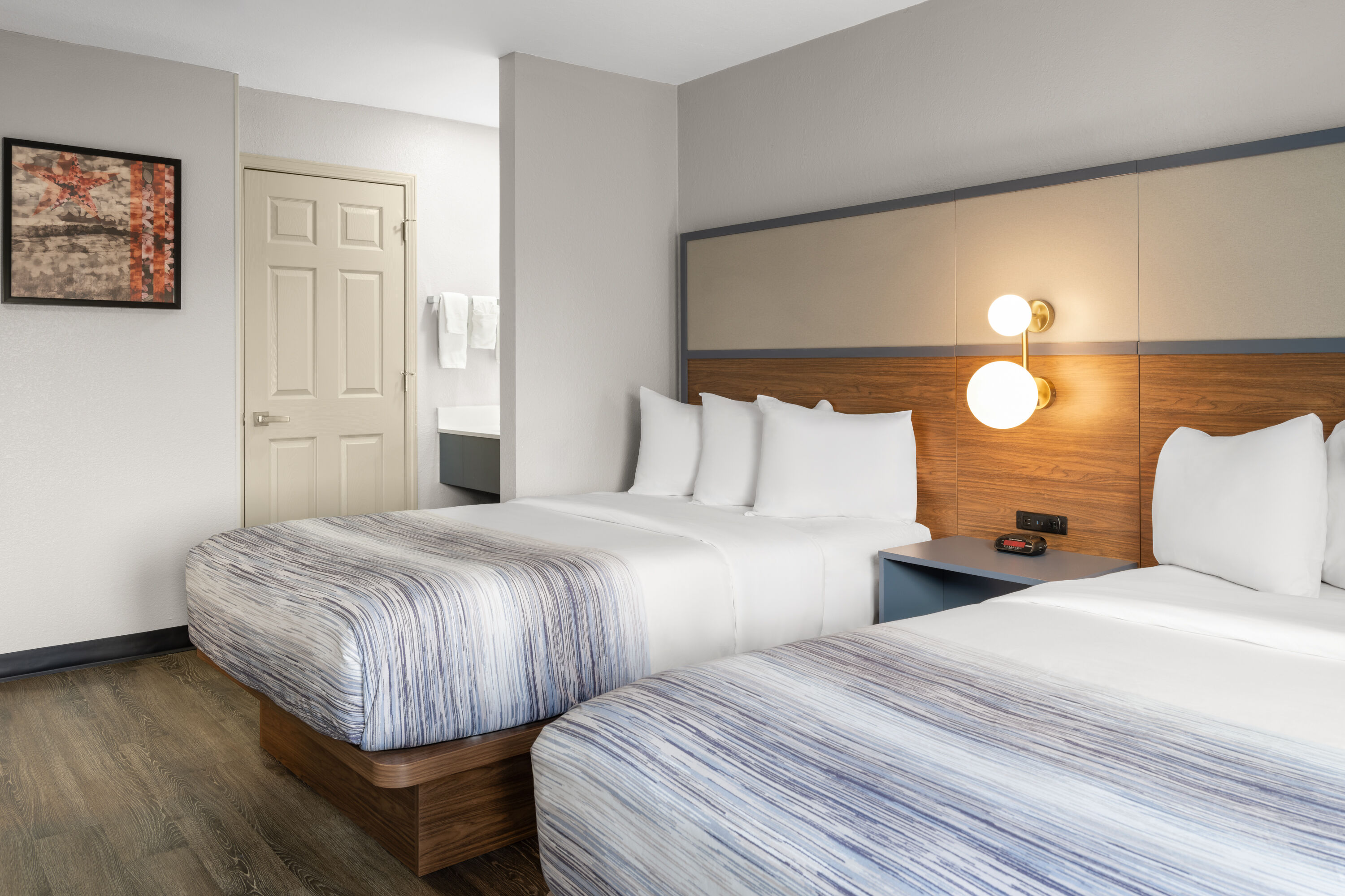 Guest room at the AmericInn by Wyndham Urbana/Champaign University Area in Urbana, Illinois