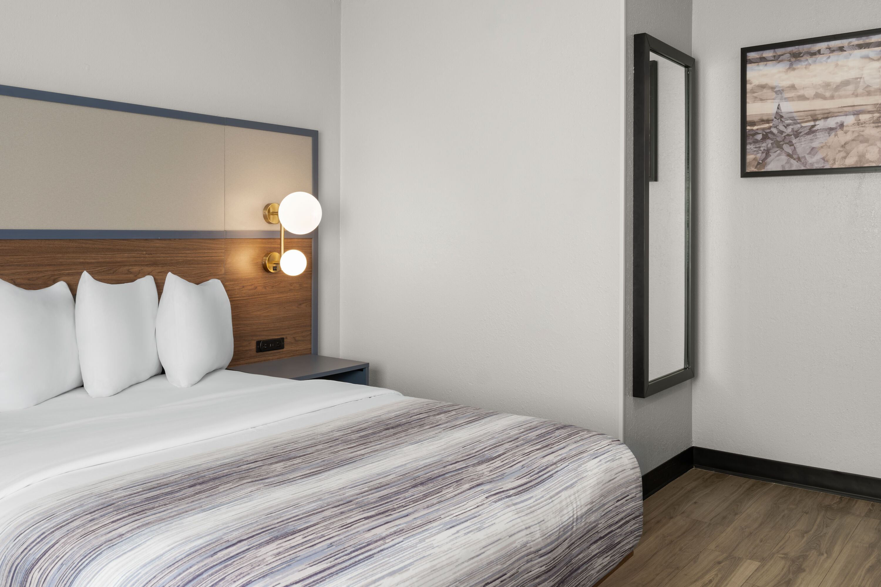 Guest room at the AmericInn by Wyndham Urbana/Champaign University Area in Urbana, Illinois