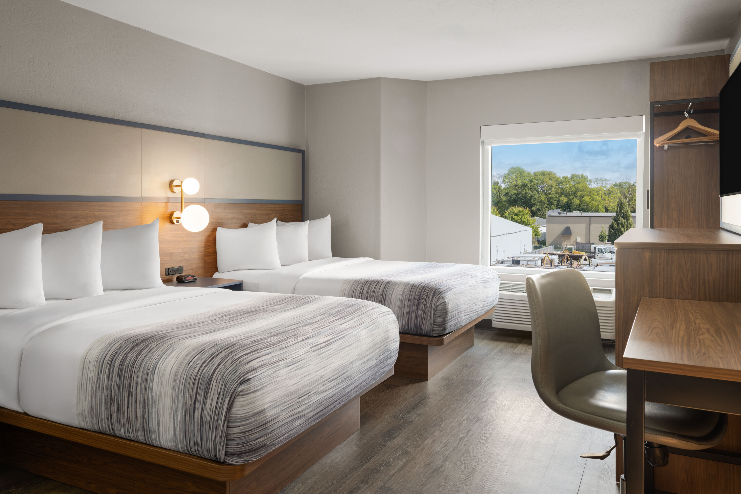 Guest room at the AmericInn by Wyndham Urbana/Champaign University Area in Urbana, Illinois