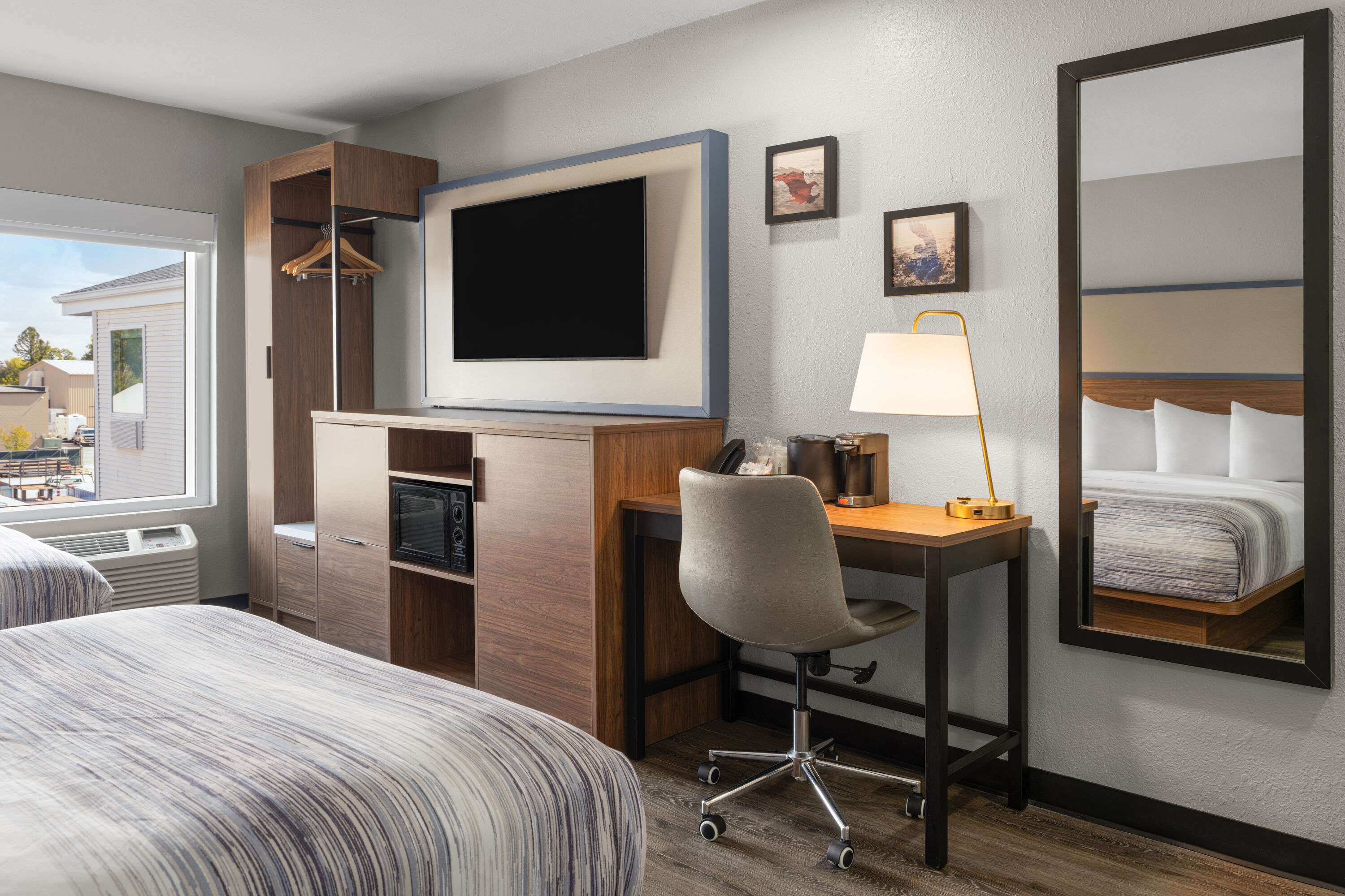 Guest room at the AmericInn by Wyndham Urbana/Champaign University Area in Urbana, Illinois