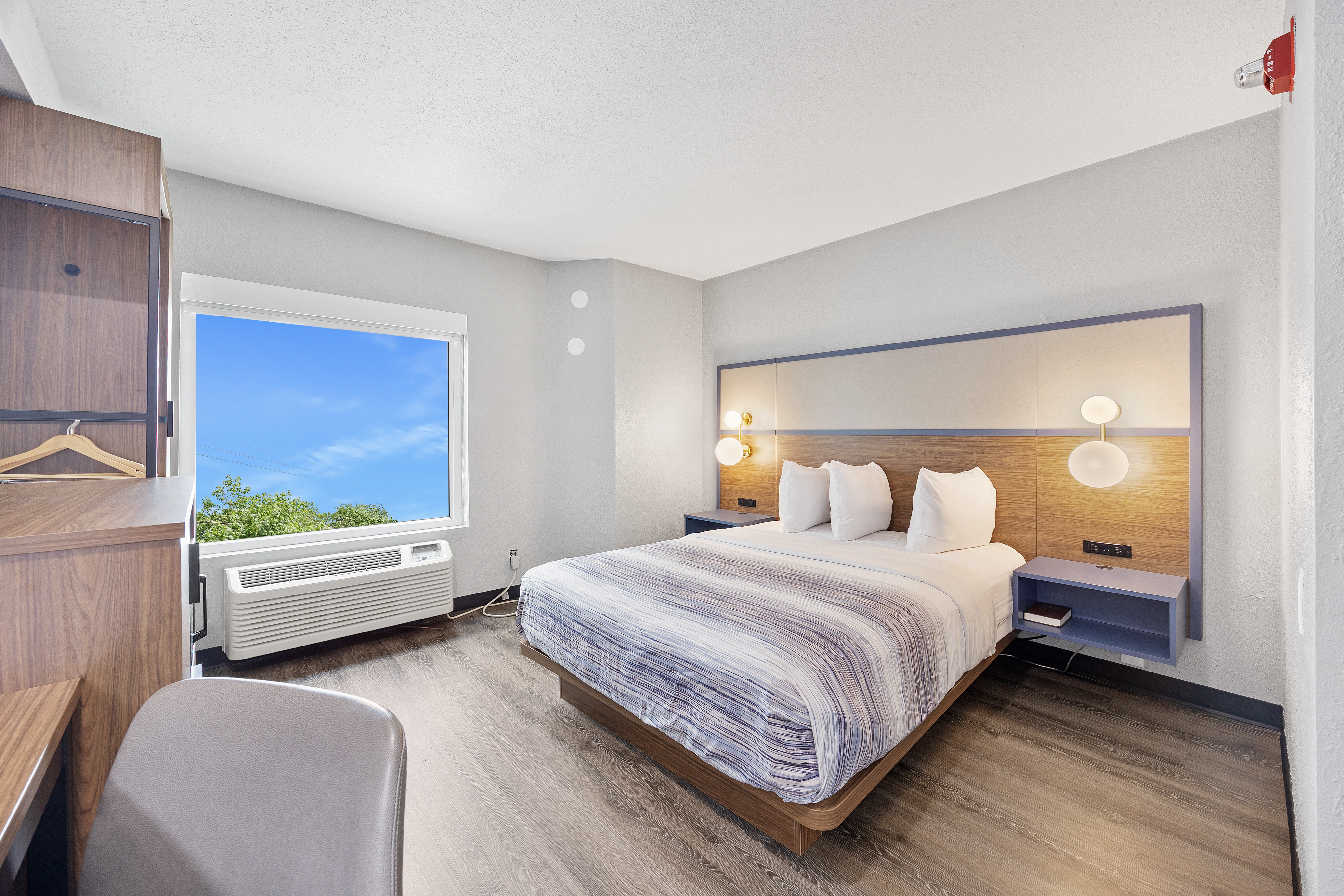 Guest room at the AmericInn by Wyndham Urbana/Champaign University Area in Urbana, Illinois