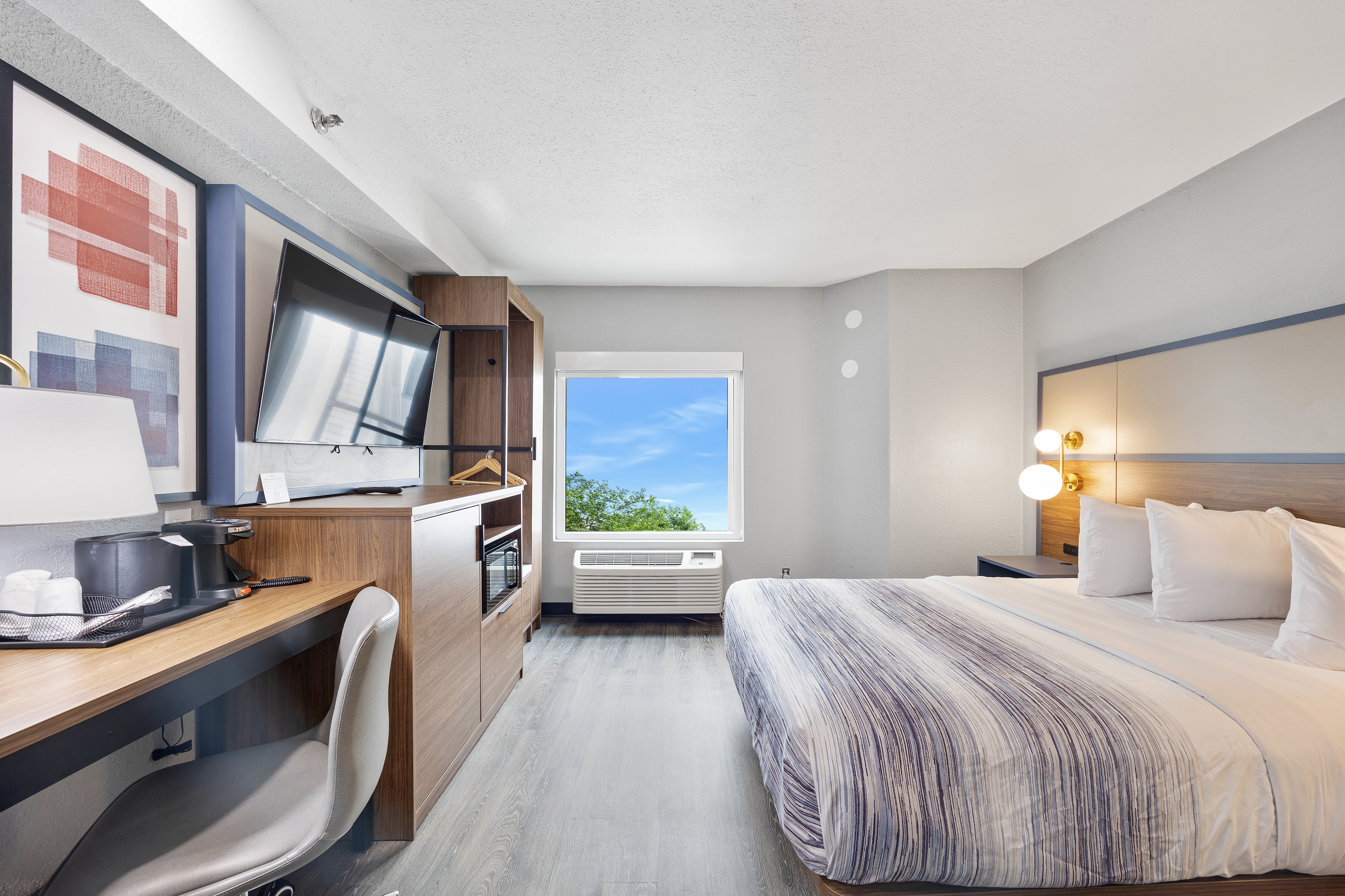 Guest room at the AmericInn by Wyndham Urbana/Champaign University Area in Urbana, Illinois