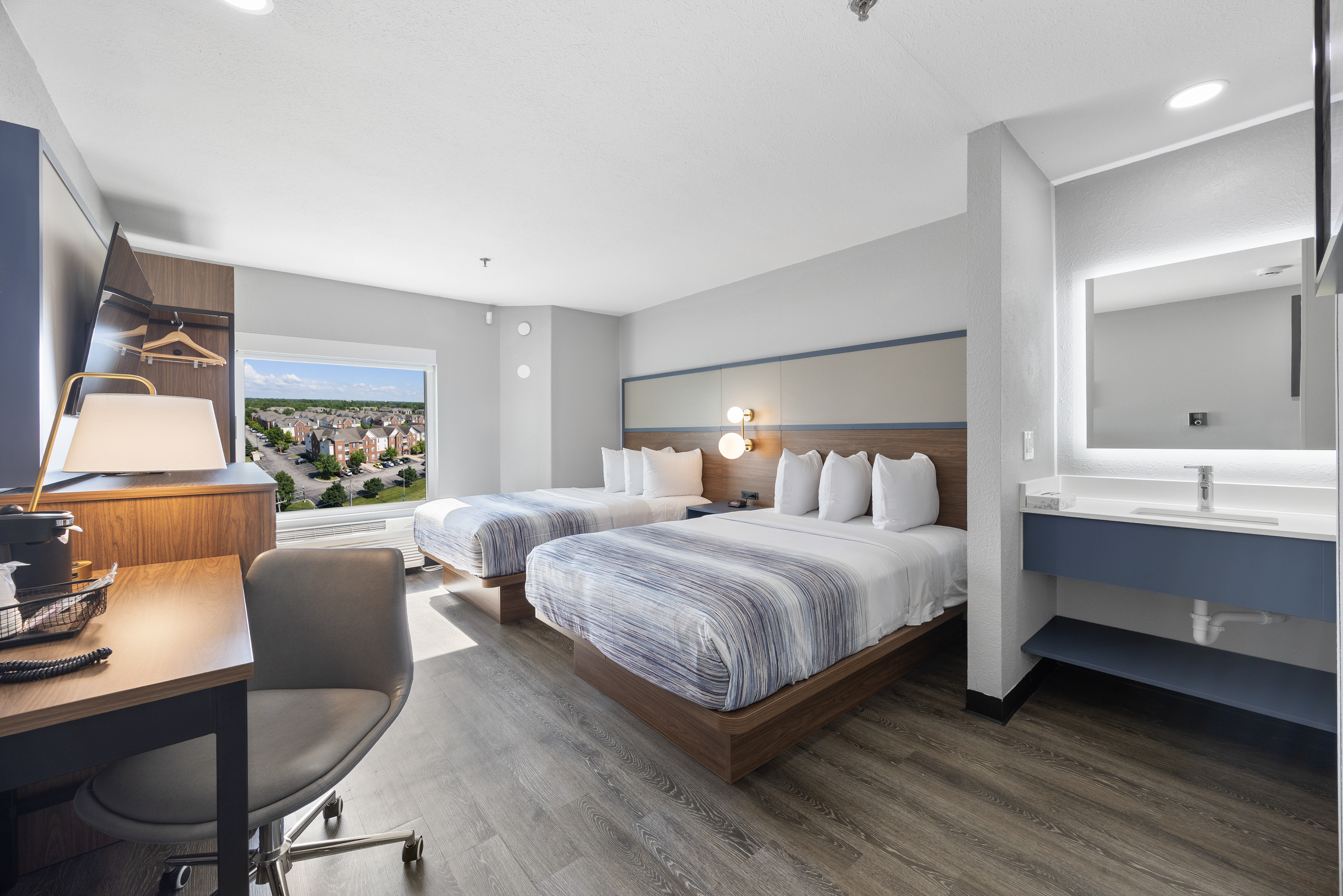 Guest room at the AmericInn by Wyndham Urbana/Champaign University Area in Urbana, Illinois